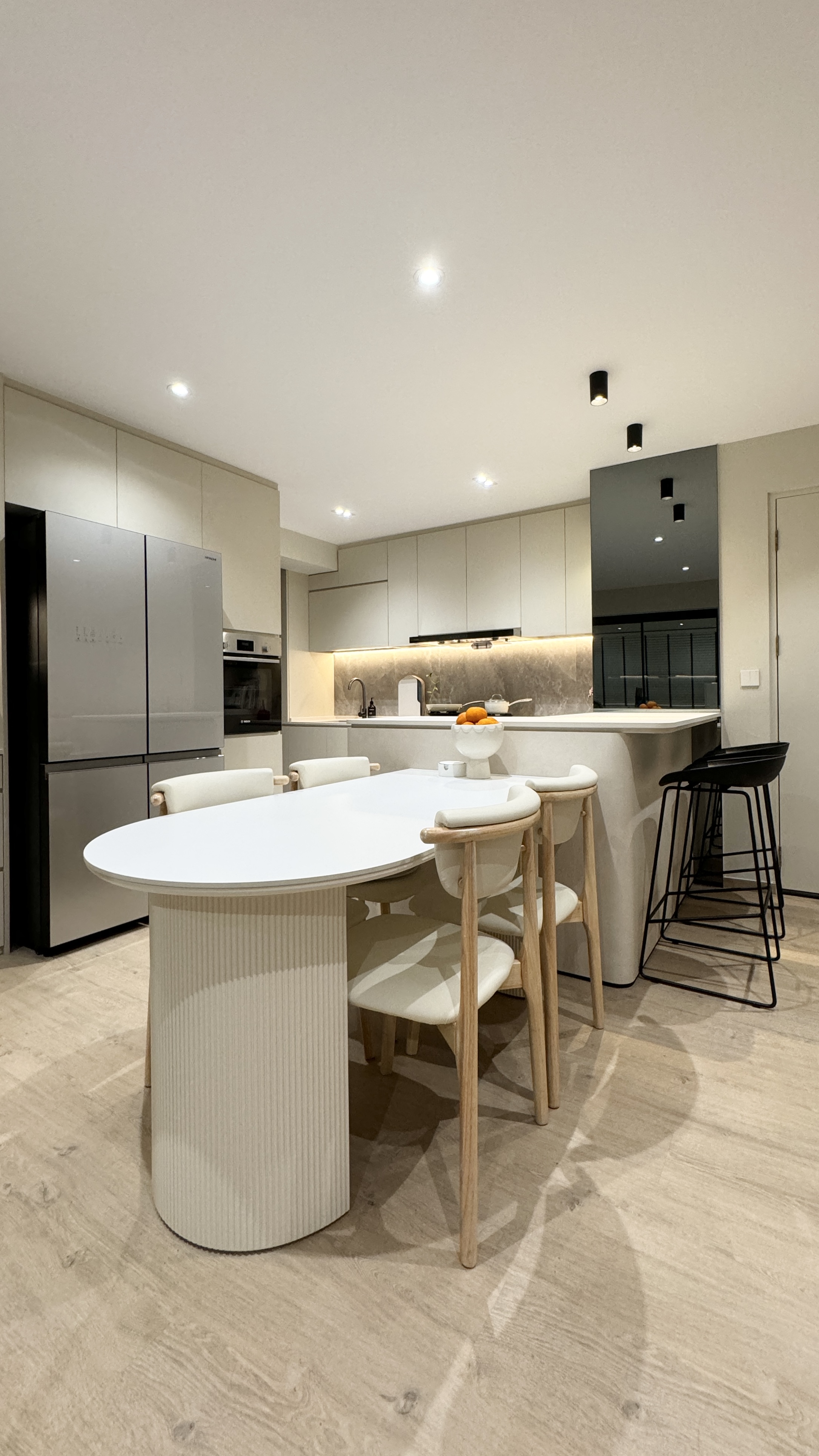 🏠 The Journey to Finding The Little Starry Loft - Modern kitchen with sleek stainless steel appliances, white marble