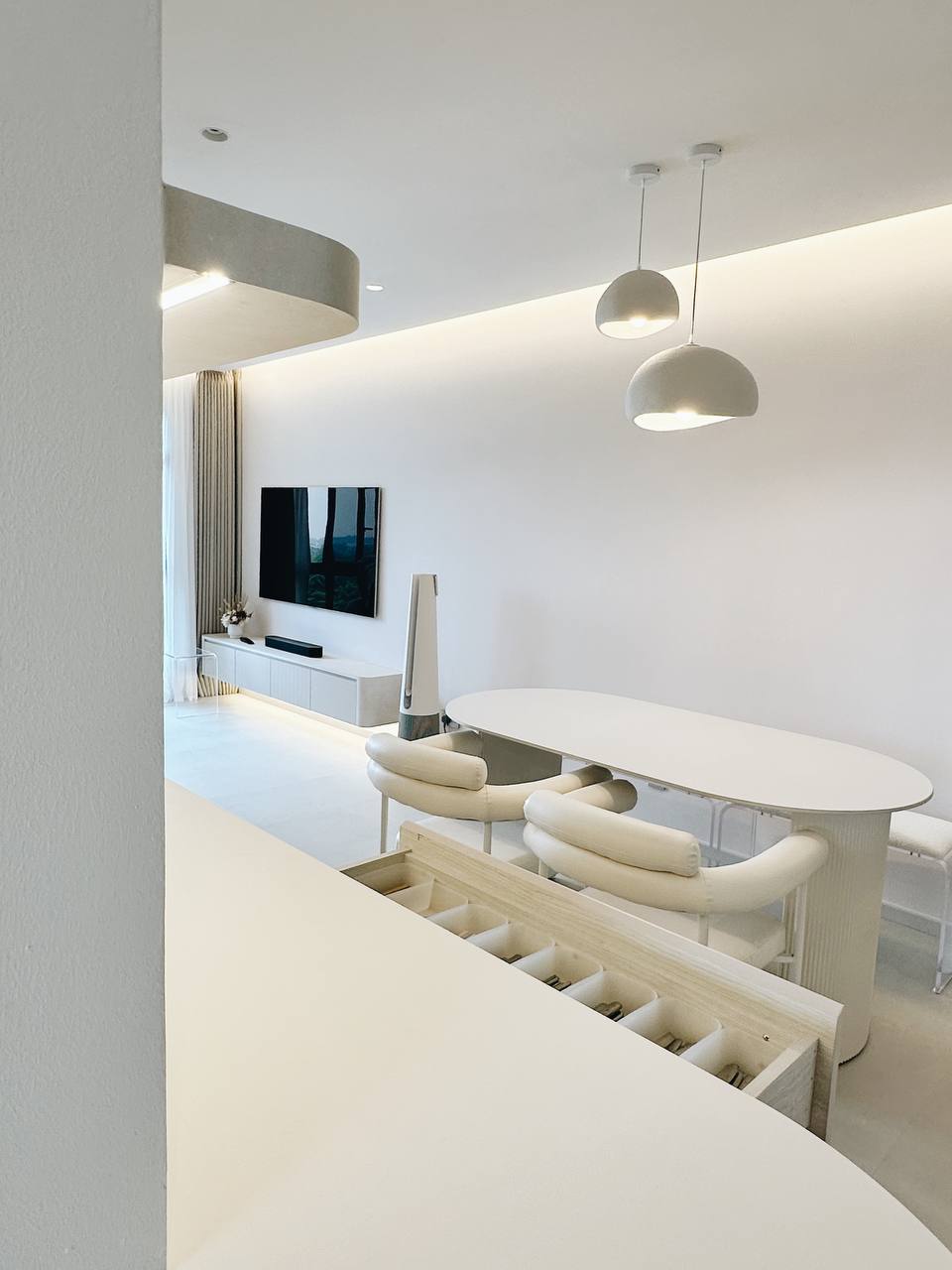 Our Dining Room: 3m of uncluttered storage space!  - Modern minimalist living room, sleek white furniture, contemporary