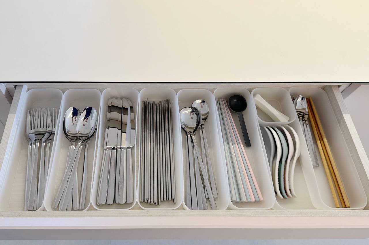 Our Dining Room: 3m of uncluttered storage space!  - silverware organizer, neatly organized, white storage box, stainless