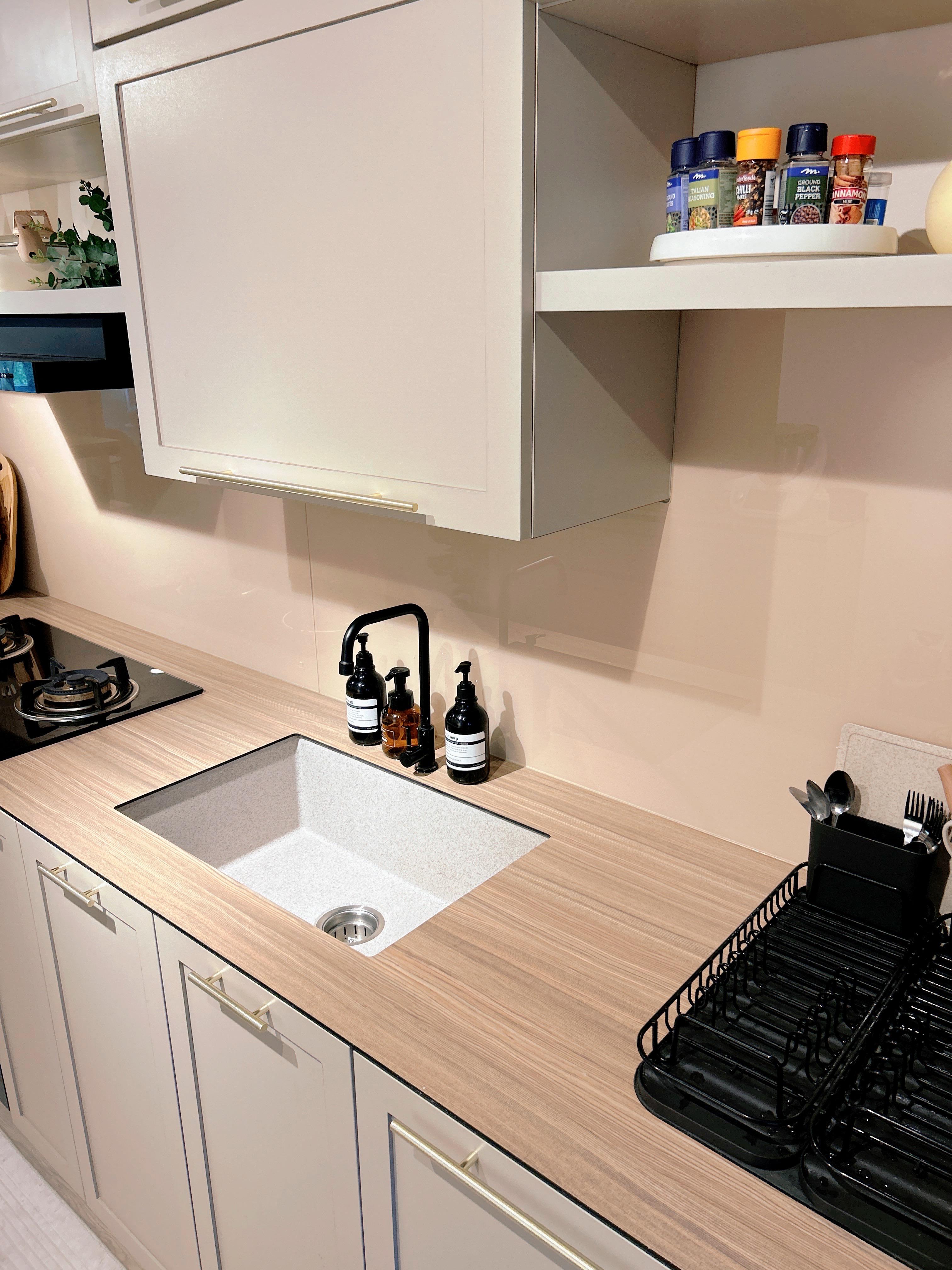 An Open-Concept Galley Kitchen: Where Style Meets Function - Wooden kitchen countertop, modern kitchen cabinets, white upper