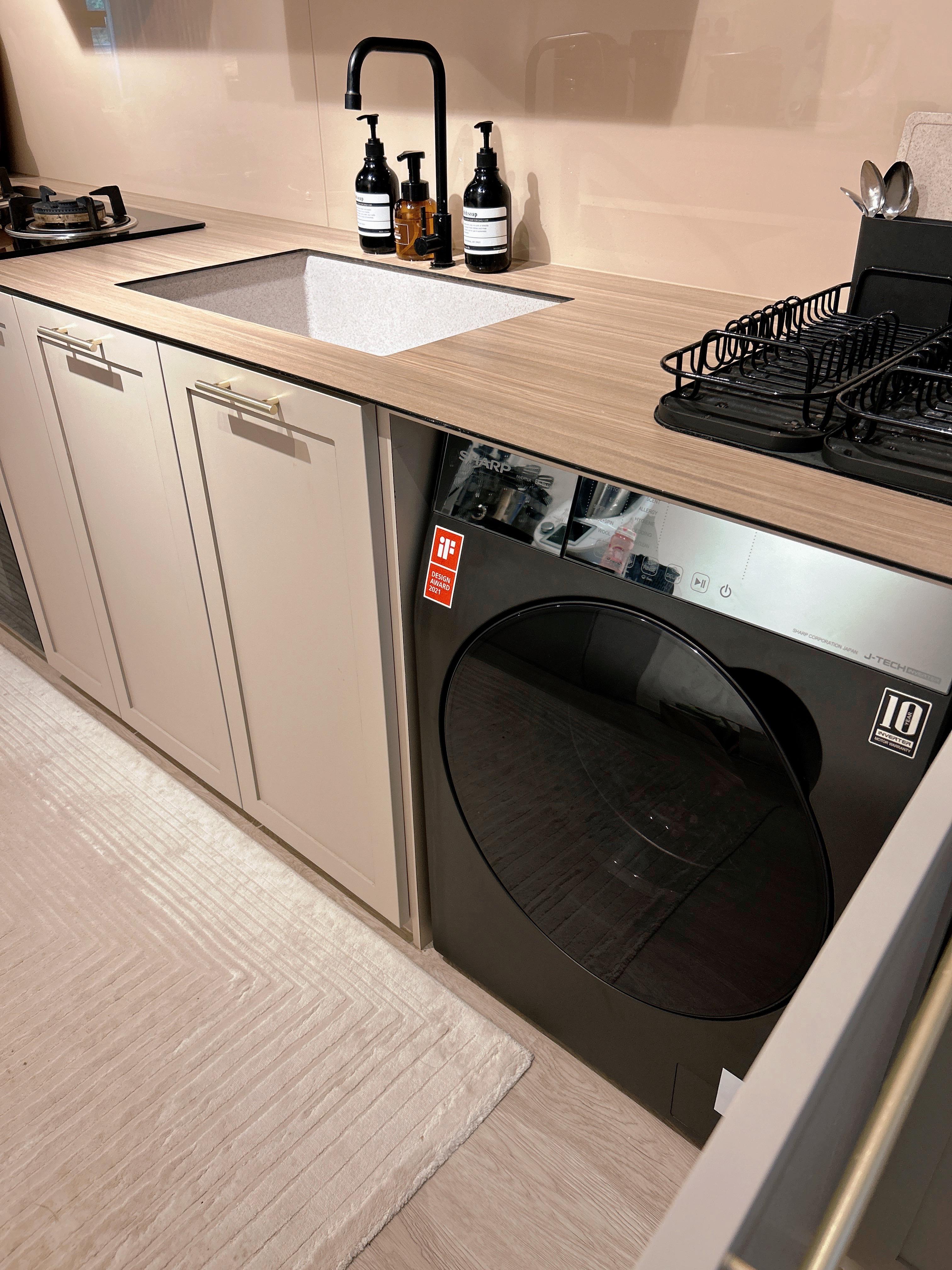 An Open-Concept Galley Kitchen: Where Style Meets Function - Modern kitchen with sleek appliances, stainless steel