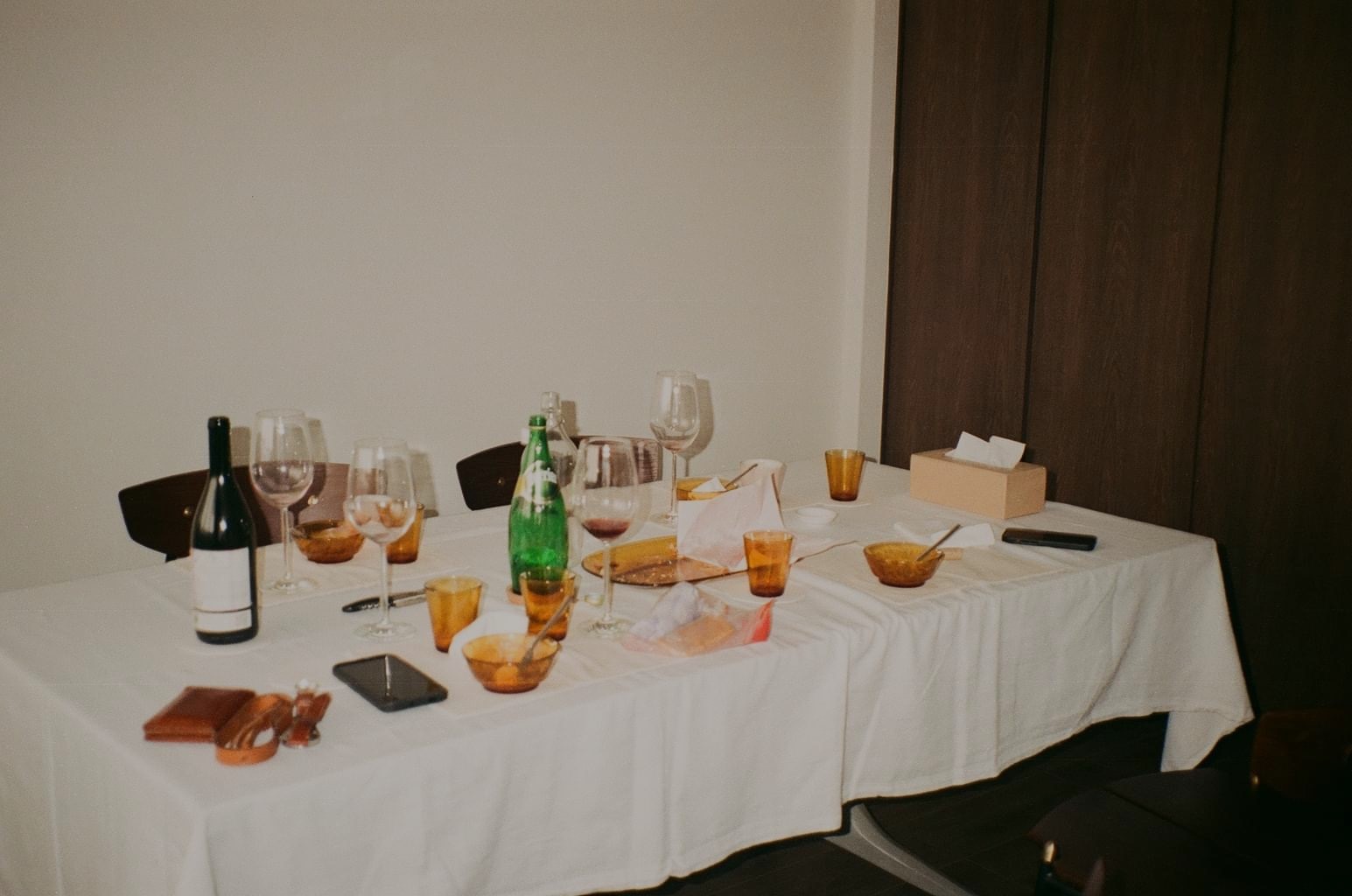 The Heart: The many faces of our Dining Room - table setting, wine glasses, empty wine glasses, wine bottle, green bottle