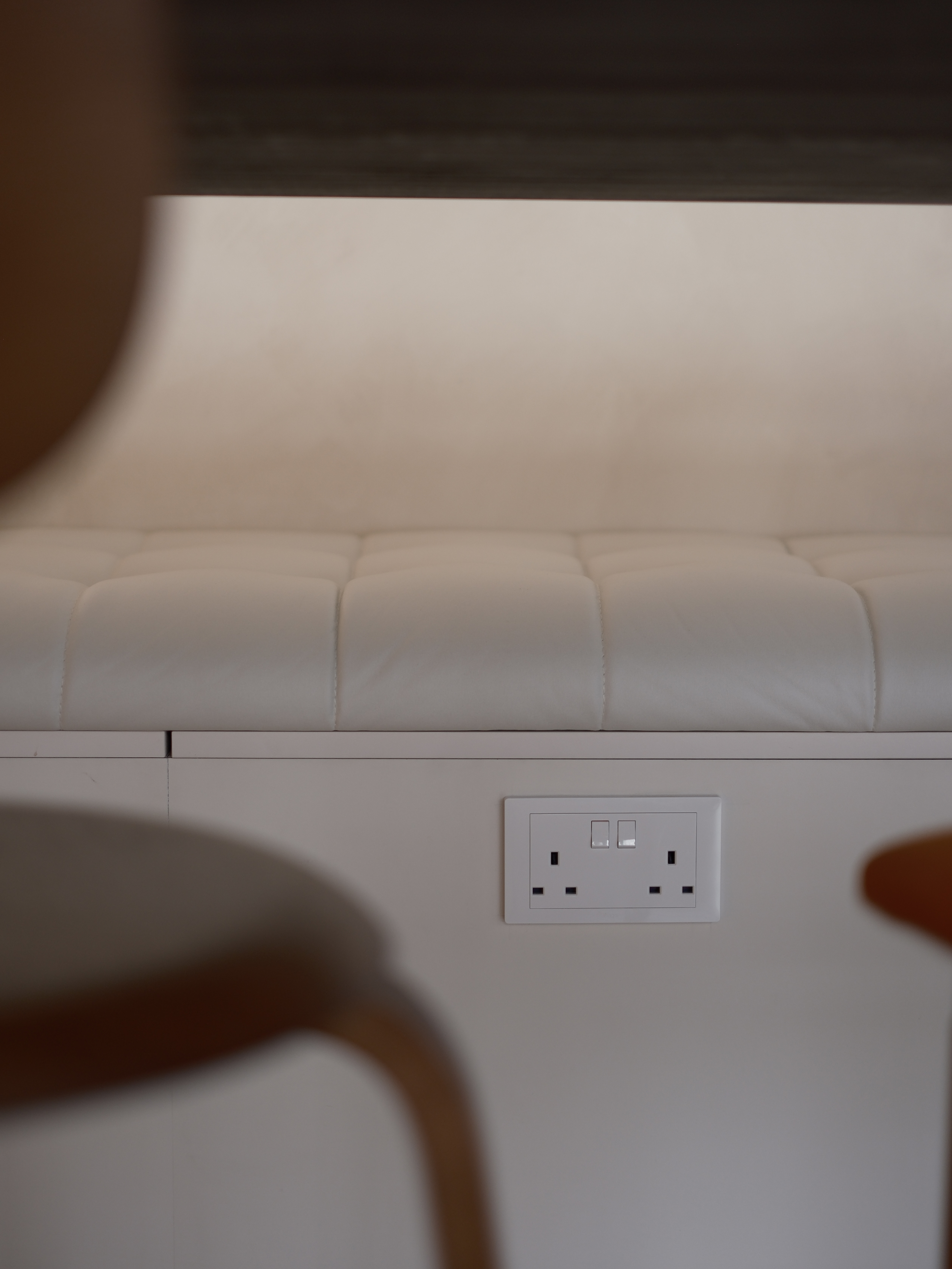 Embracing Minimalism in our Airy Dining Nook  - White, cushioned, modern, minimalist, cozy, soft, plush, tufted, leather