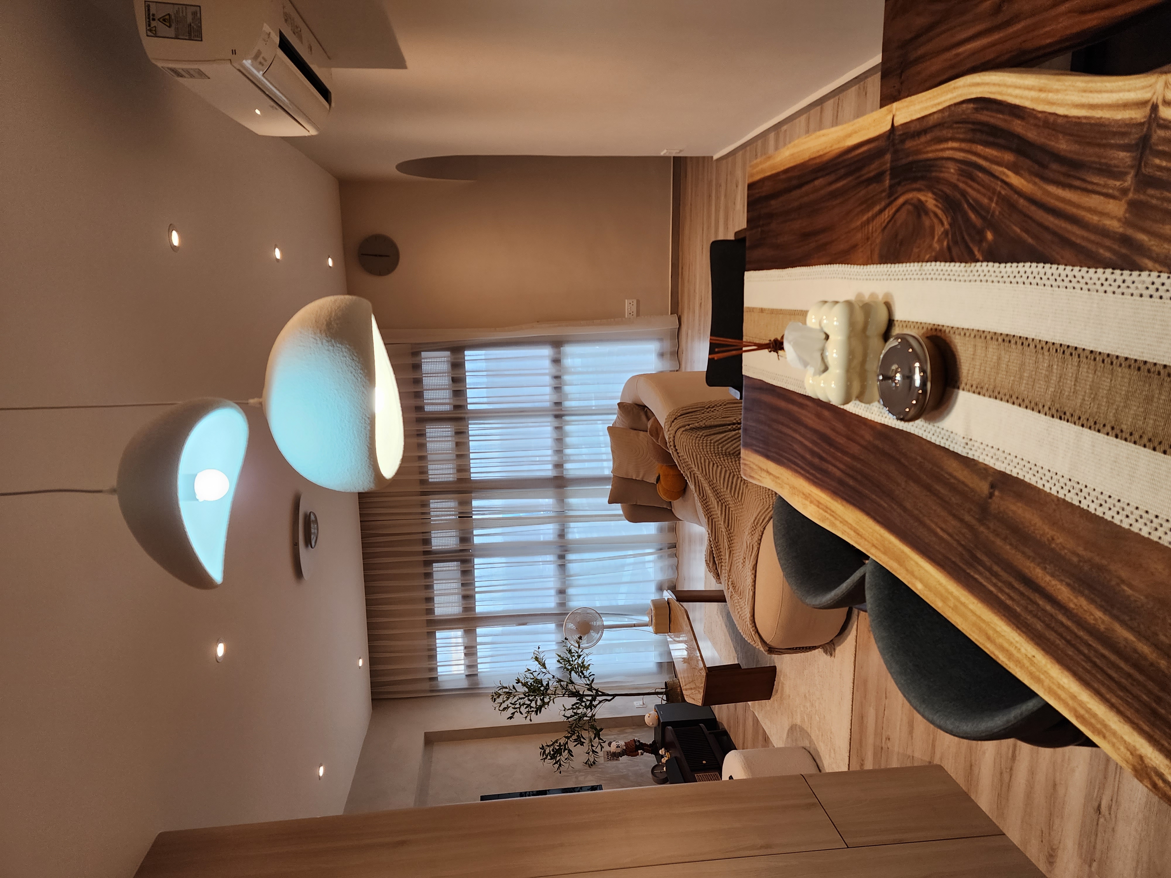 Dining Area - a cosy place where we host family and friends - Modern minimalist bedroom, cozy seating area, large window with