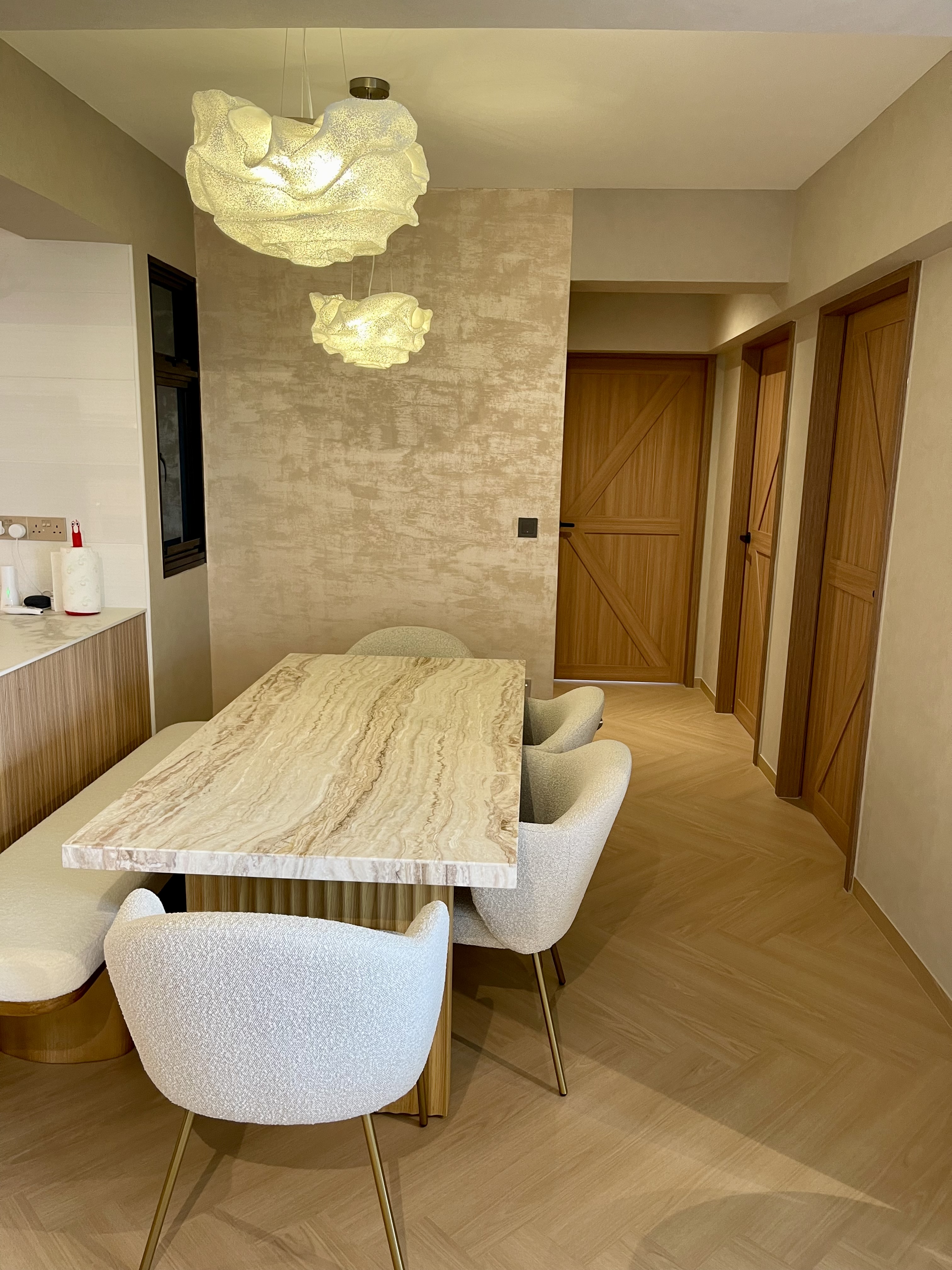 Our Dining Space: Where Fluted Meets Herringbone 🍽️✨ - Modern dining room with marble table and chairs, contemporary design