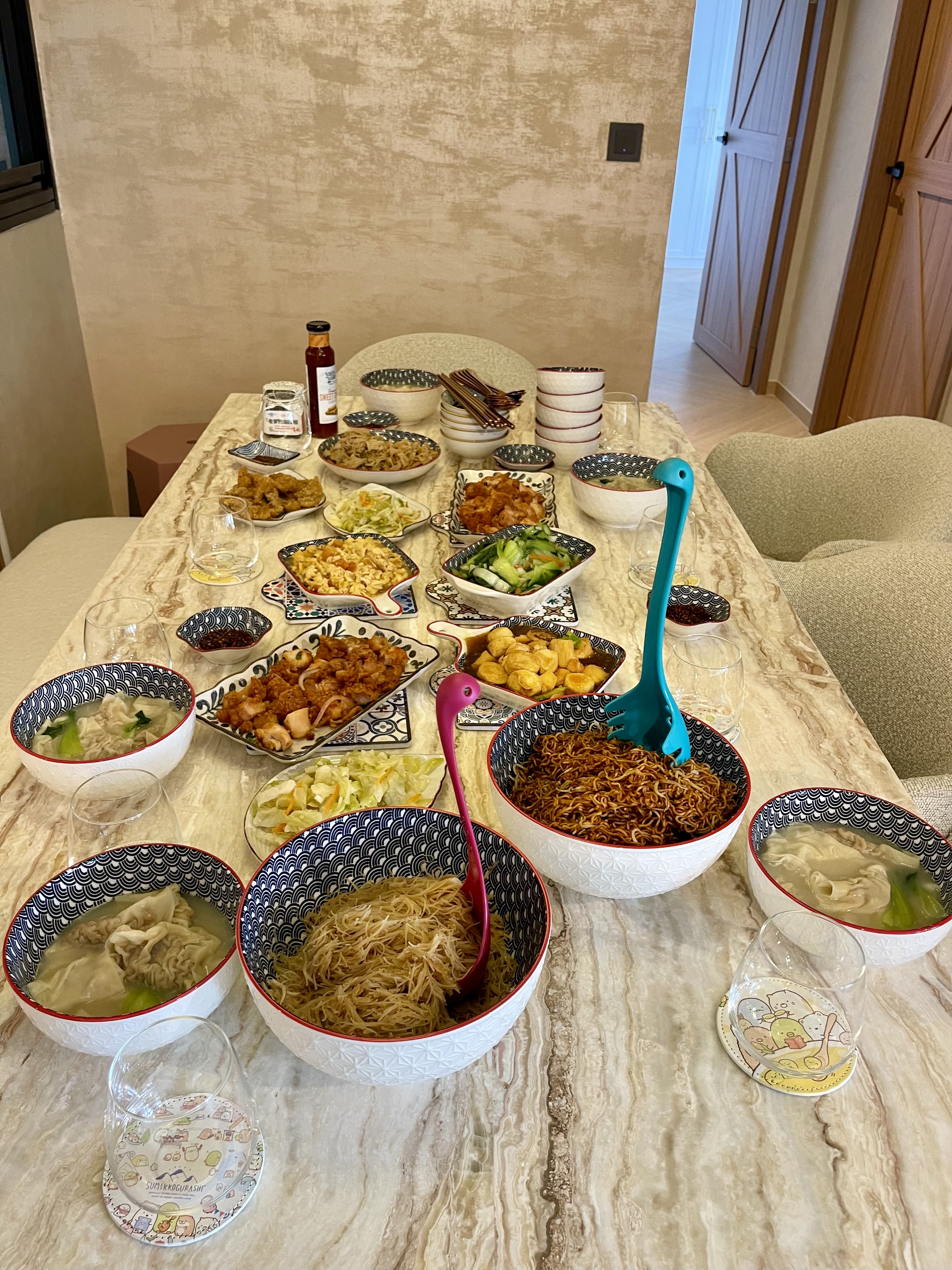 Our Dining Space: Where Fluted Meets Herringbone 🍽️✨ - Noodle bowls, assorted side dishes, colorful patterns, traditional