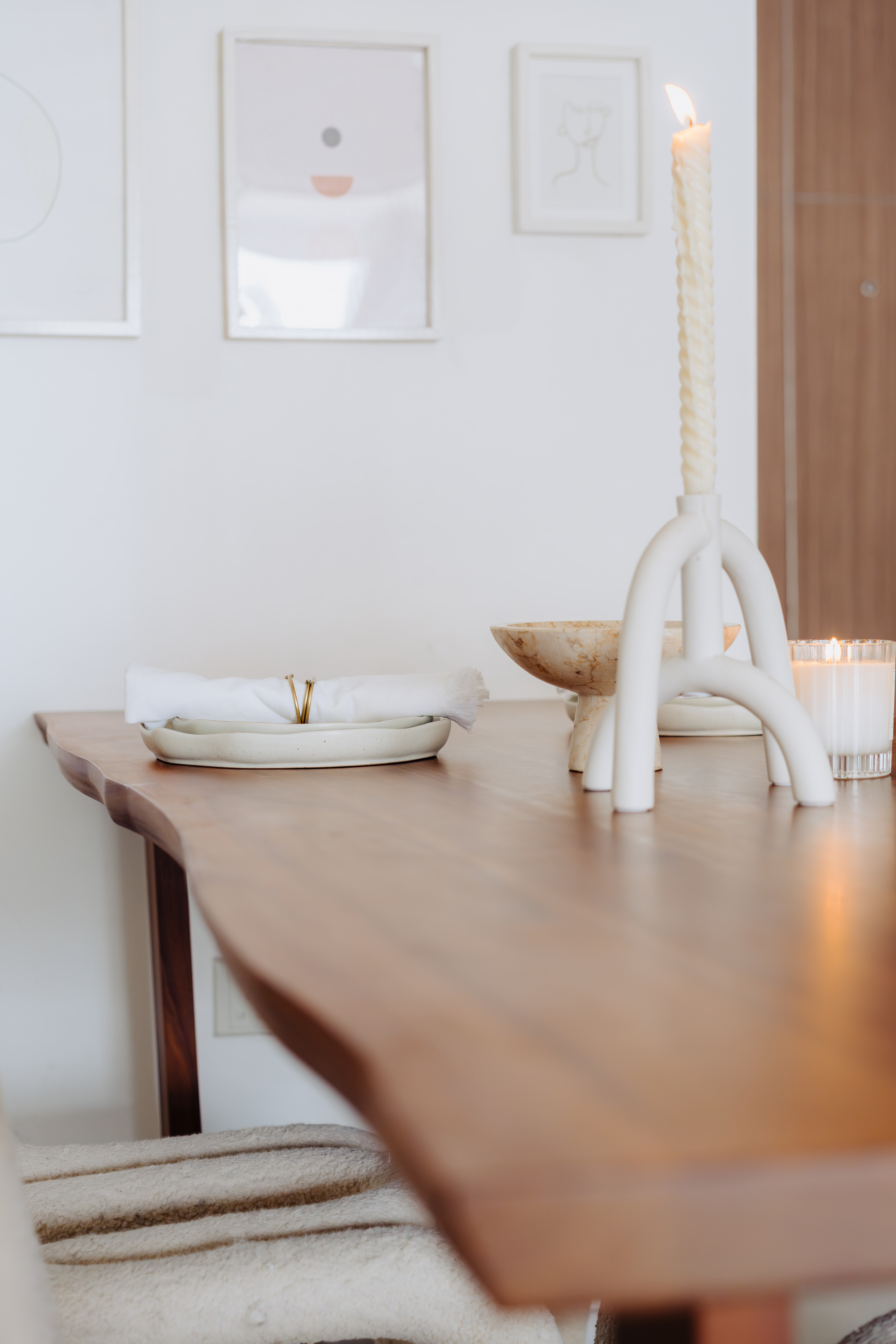 Our Dining Room: Making Magic With Styling✨ - Candle on wooden table, white candle holder, white candle flame, minimalist