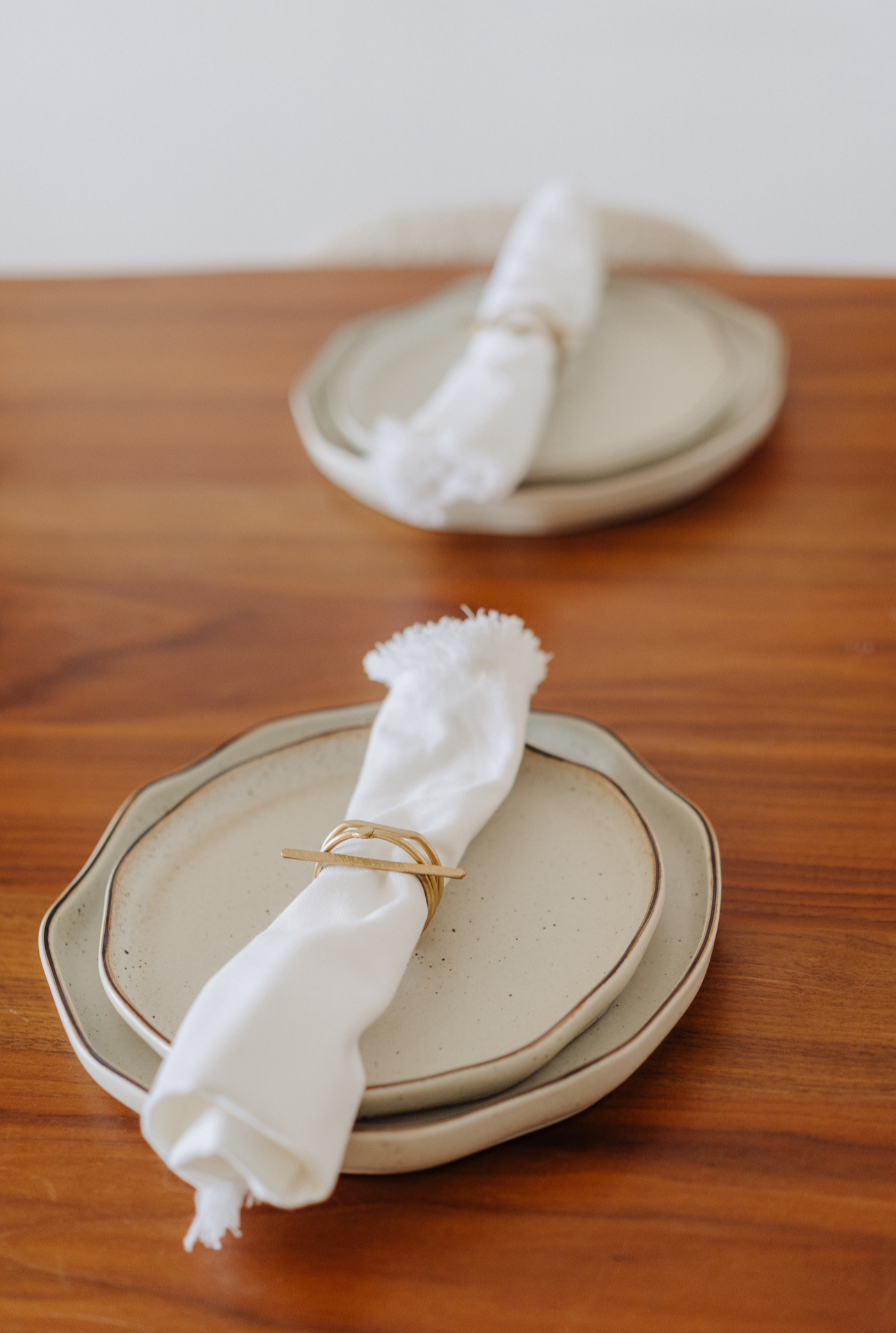 Our Dining Room: Making Magic With Styling✨ - White napkin, folded napkin, decorative napkin ring, ceramic plates, wooden