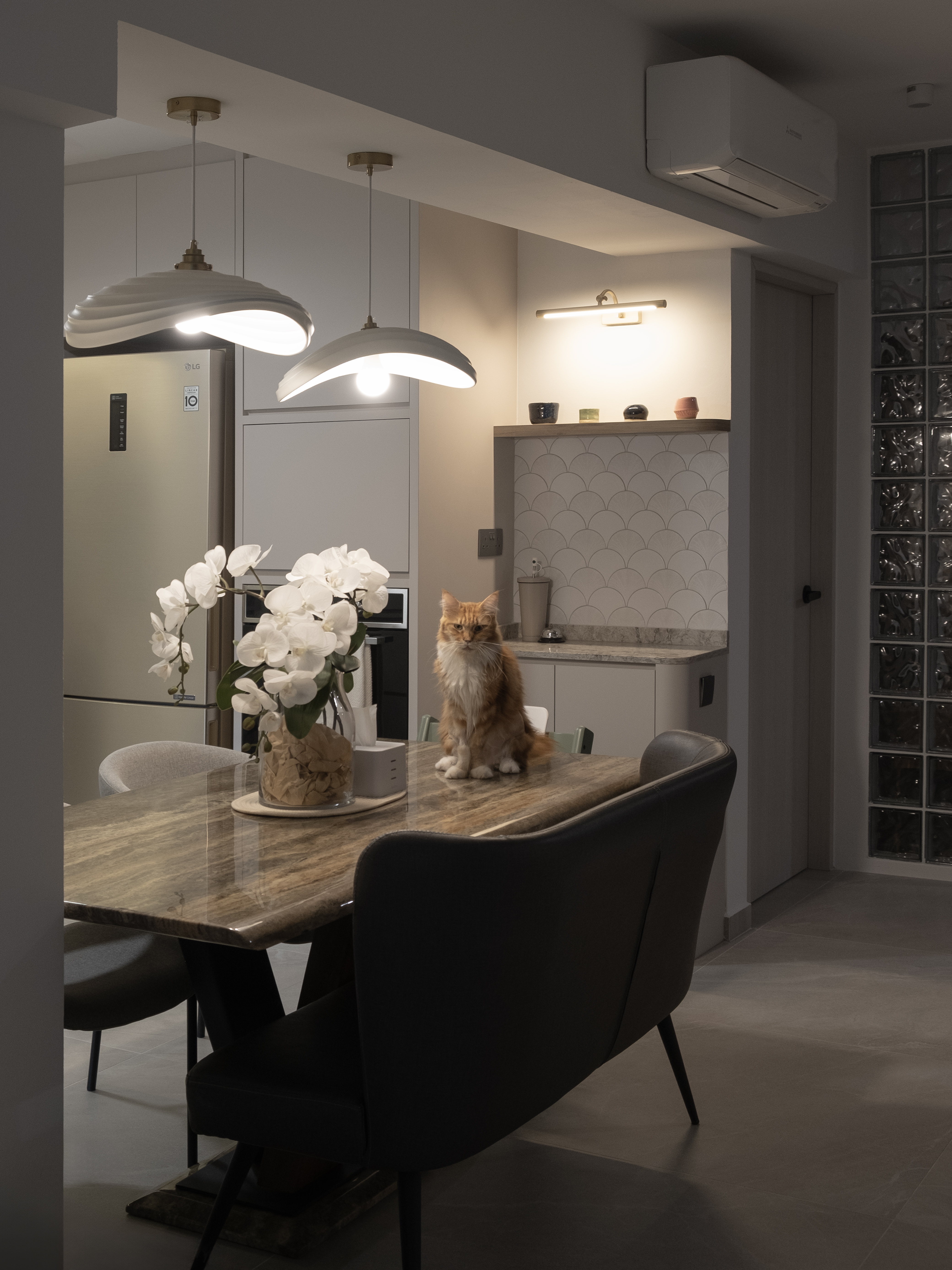 Turning Kitchen to Cosy Dining Area - Modern kitchen with elegant design, stainless steel refrigerator, elegant pendant