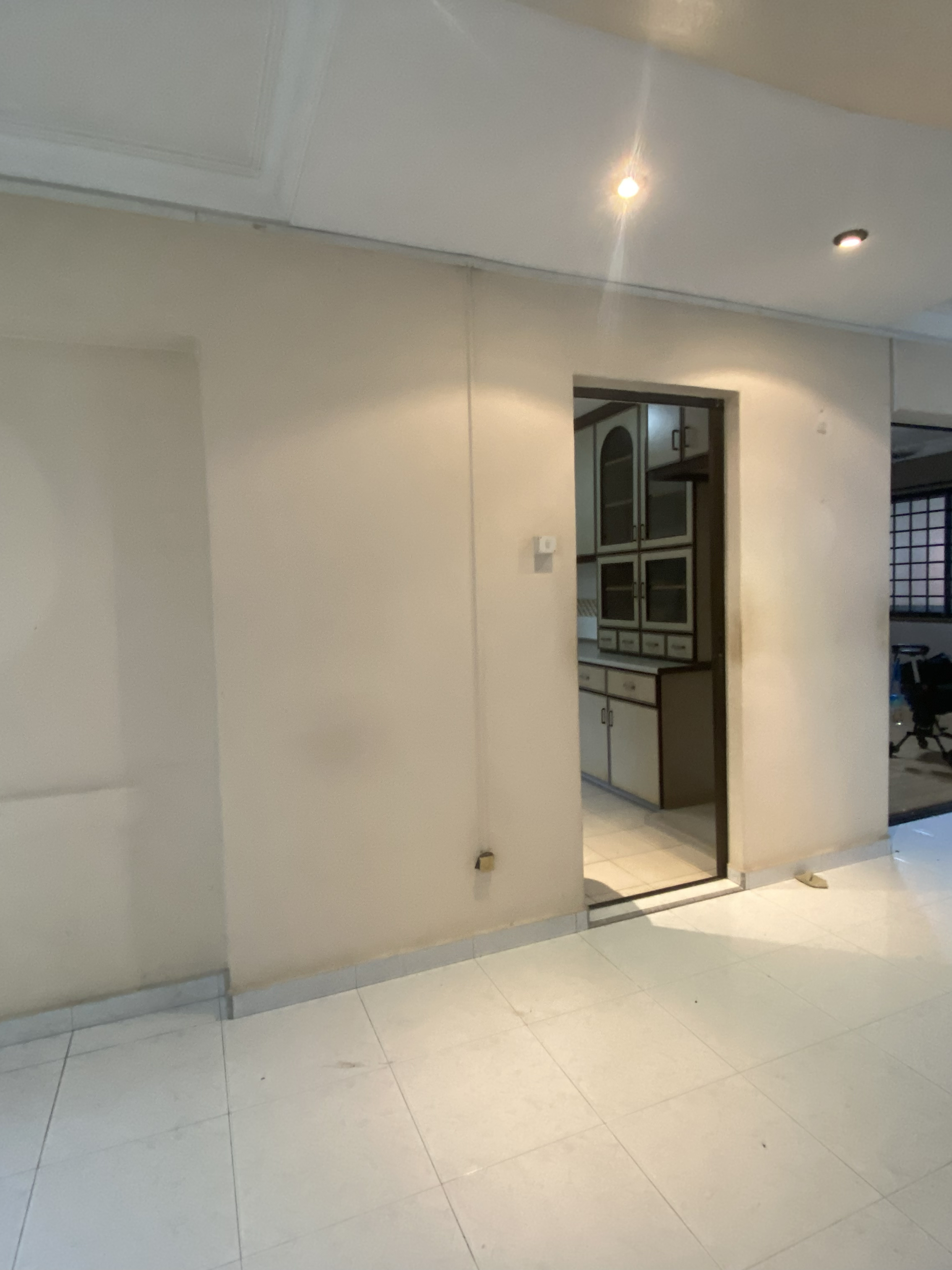 Turning Kitchen to Cosy Dining Area - Interior view of a modern kitchen with sleek cabinets and a glass door., Minimalist