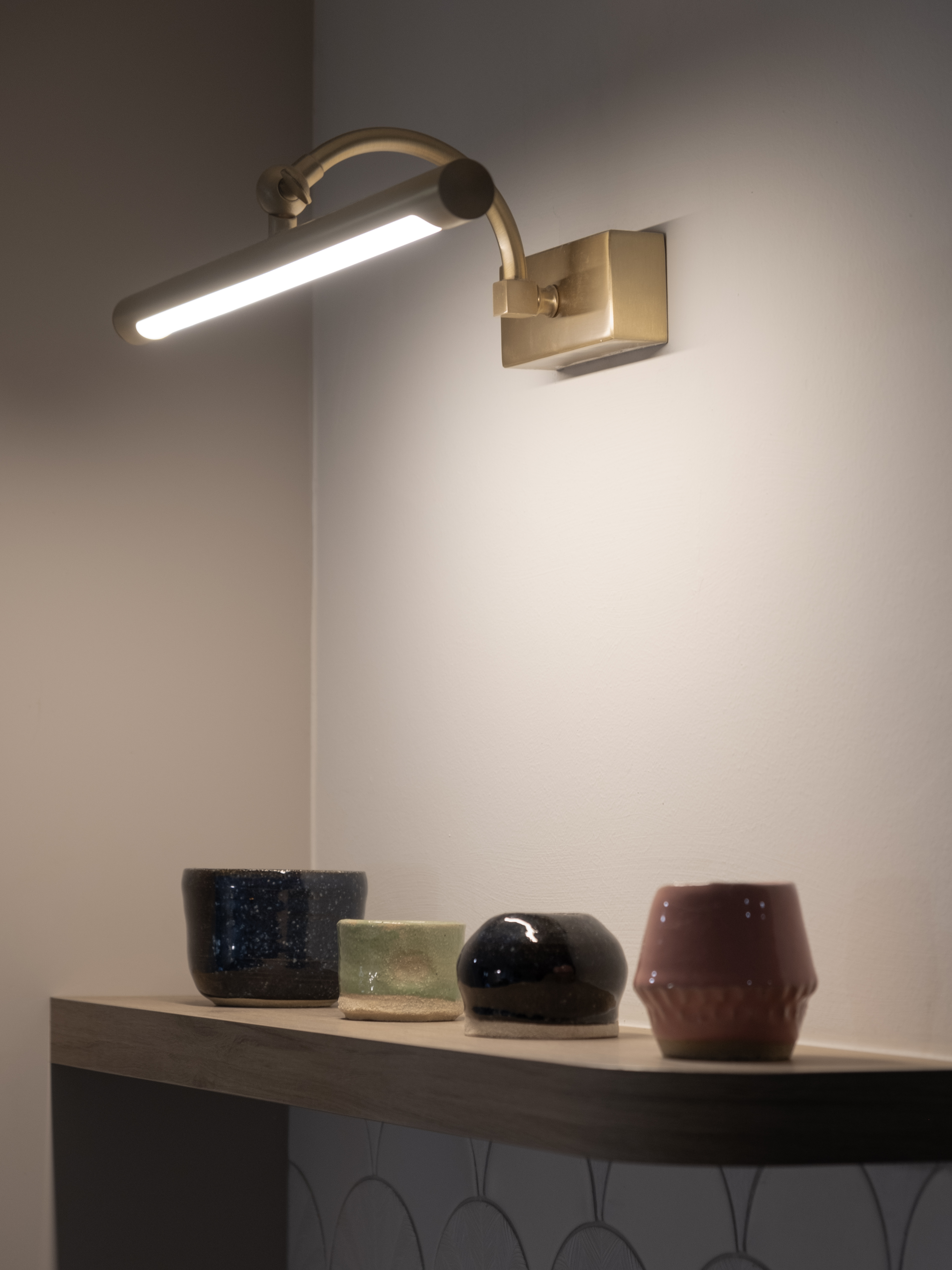 Turning Kitchen to Cosy Dining Area - Modern minimalist wall-mounted lamp, warm ambient lighting, gold finish, sleek design