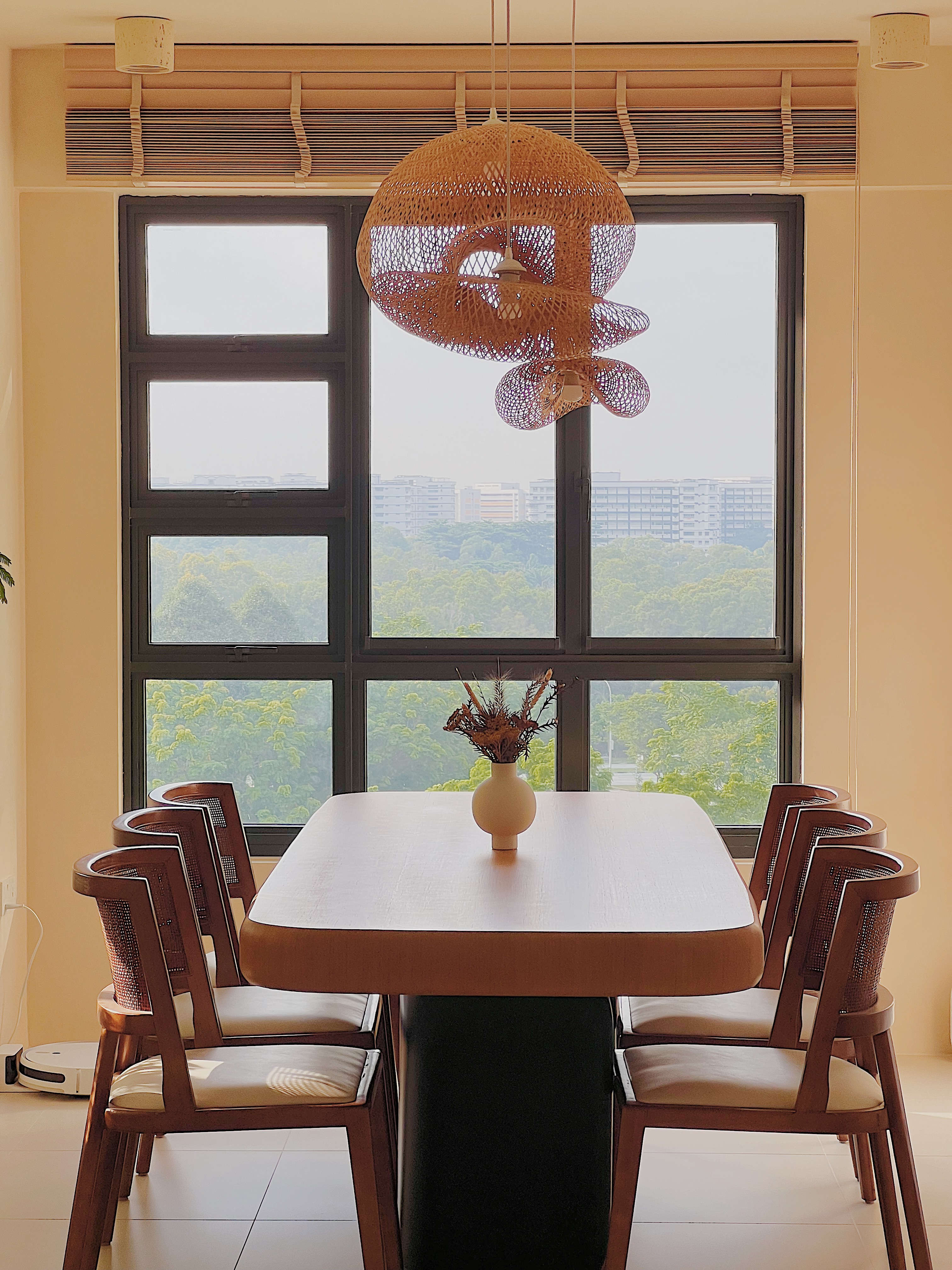 Come experience Japandi Minimalism: Our Dining Room  - Modern dining room with wooden chairs and table, large window with