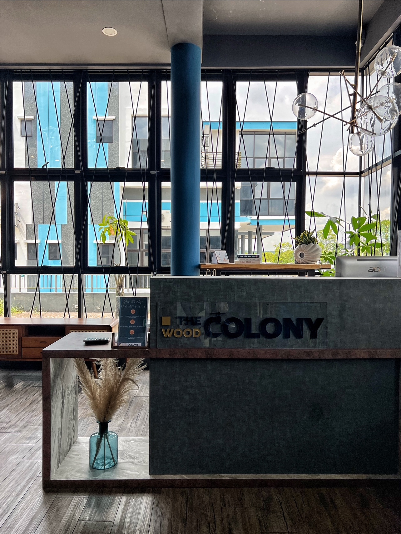 The Social Hub: Creating a space about connection and conversation - Large windows, modern interior, stylish reception desk