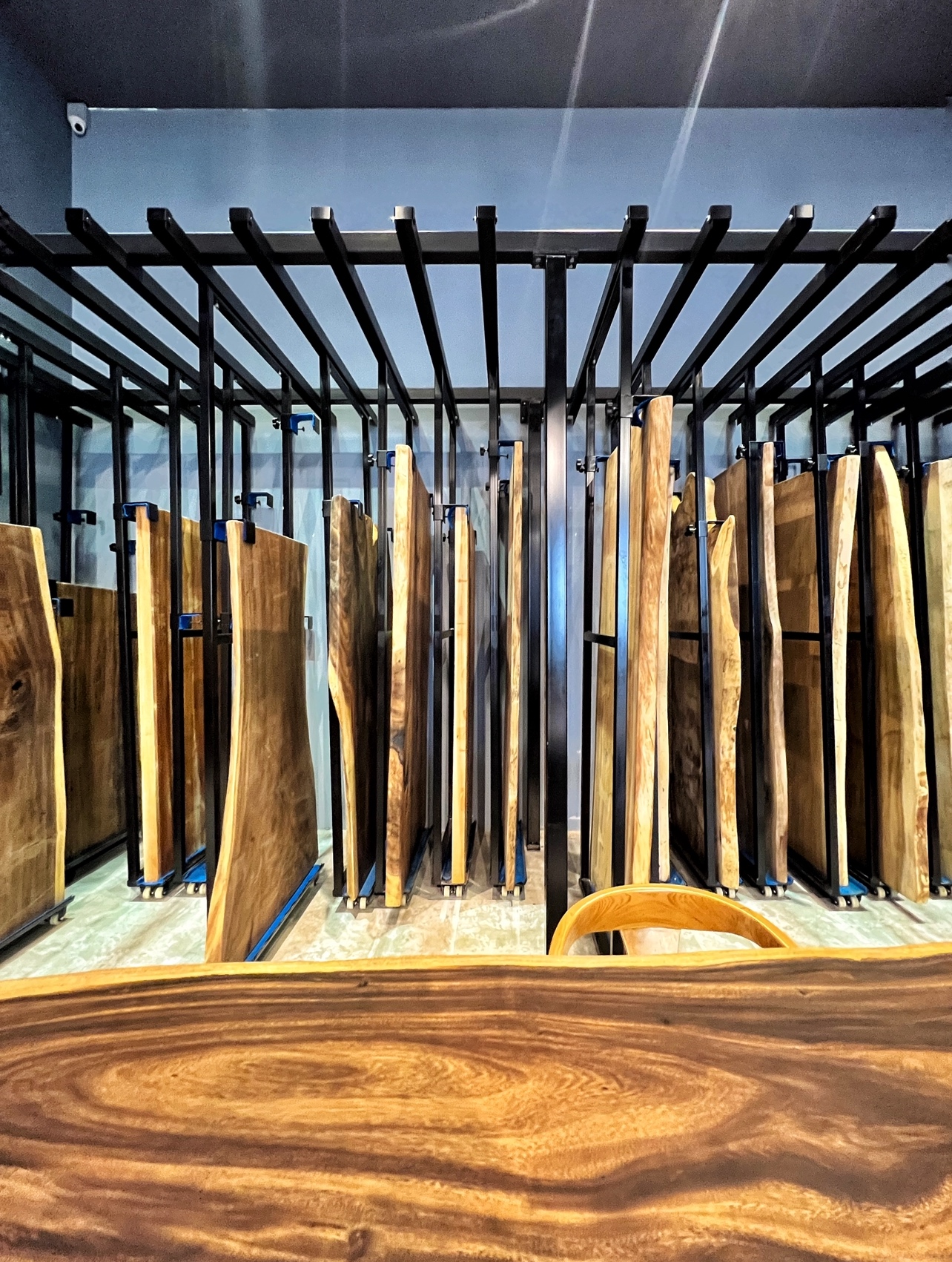 The Social Hub: Creating a space about connection and conversation - Wooden kitchen cabinets, sleek metal shelving, modern