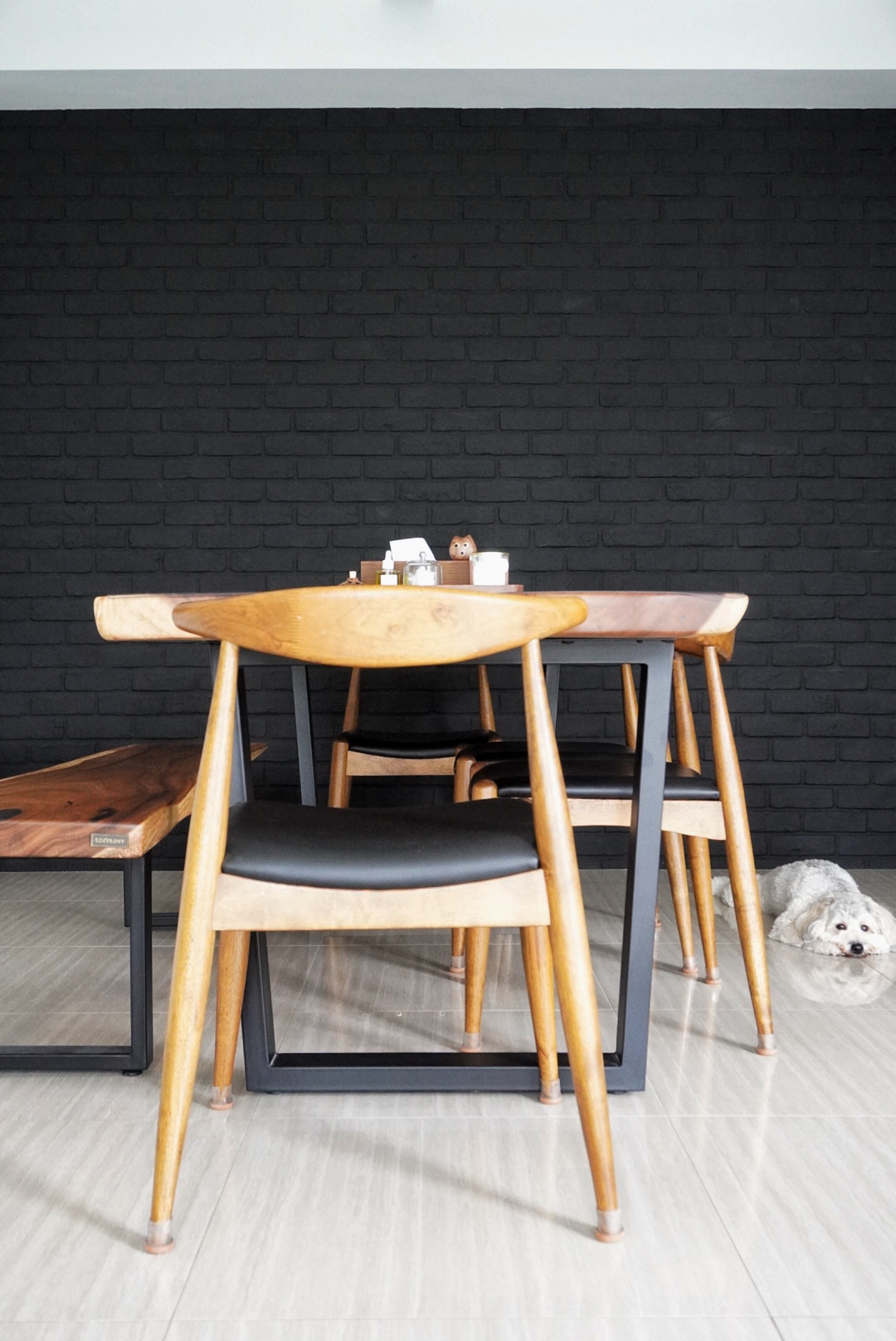 The Social Hub: Creating a space about connection and conversation - Wooden dining table, black metal frame, modern design