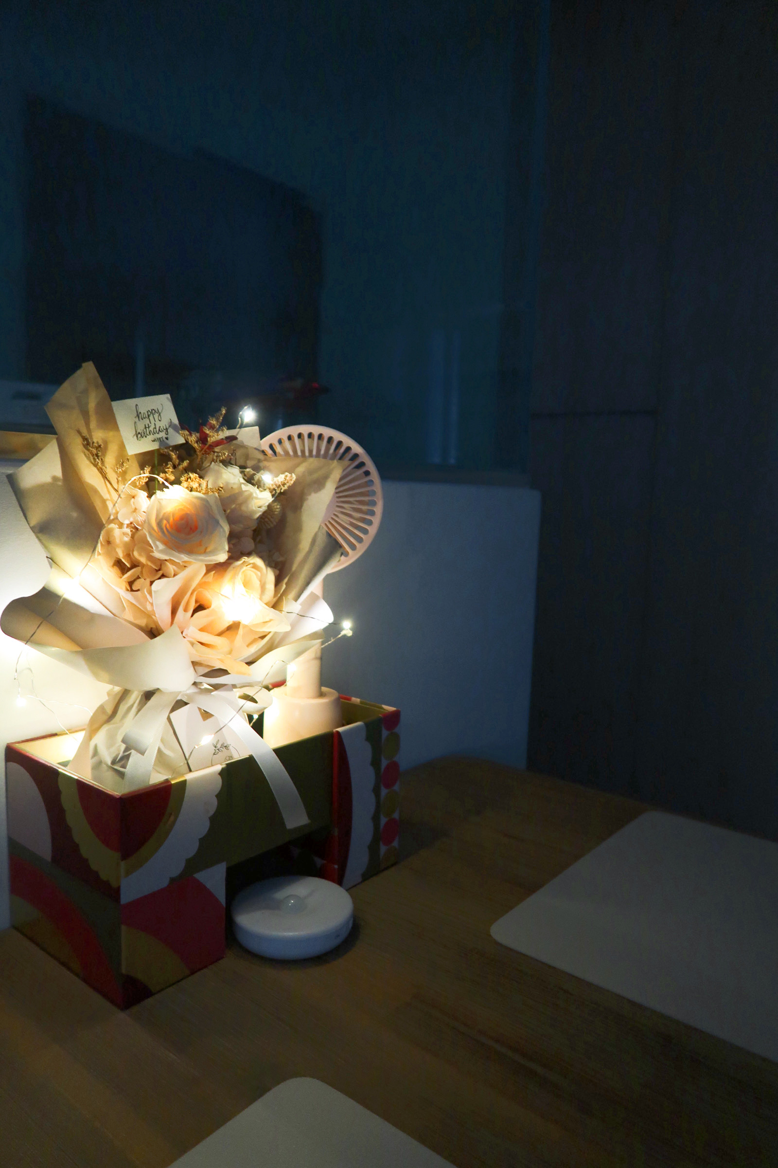 Our Dining Area: Aesthetic dining vibes - Floral arrangement, cozy atmosphere, dim lighting, decorative bouquet, white