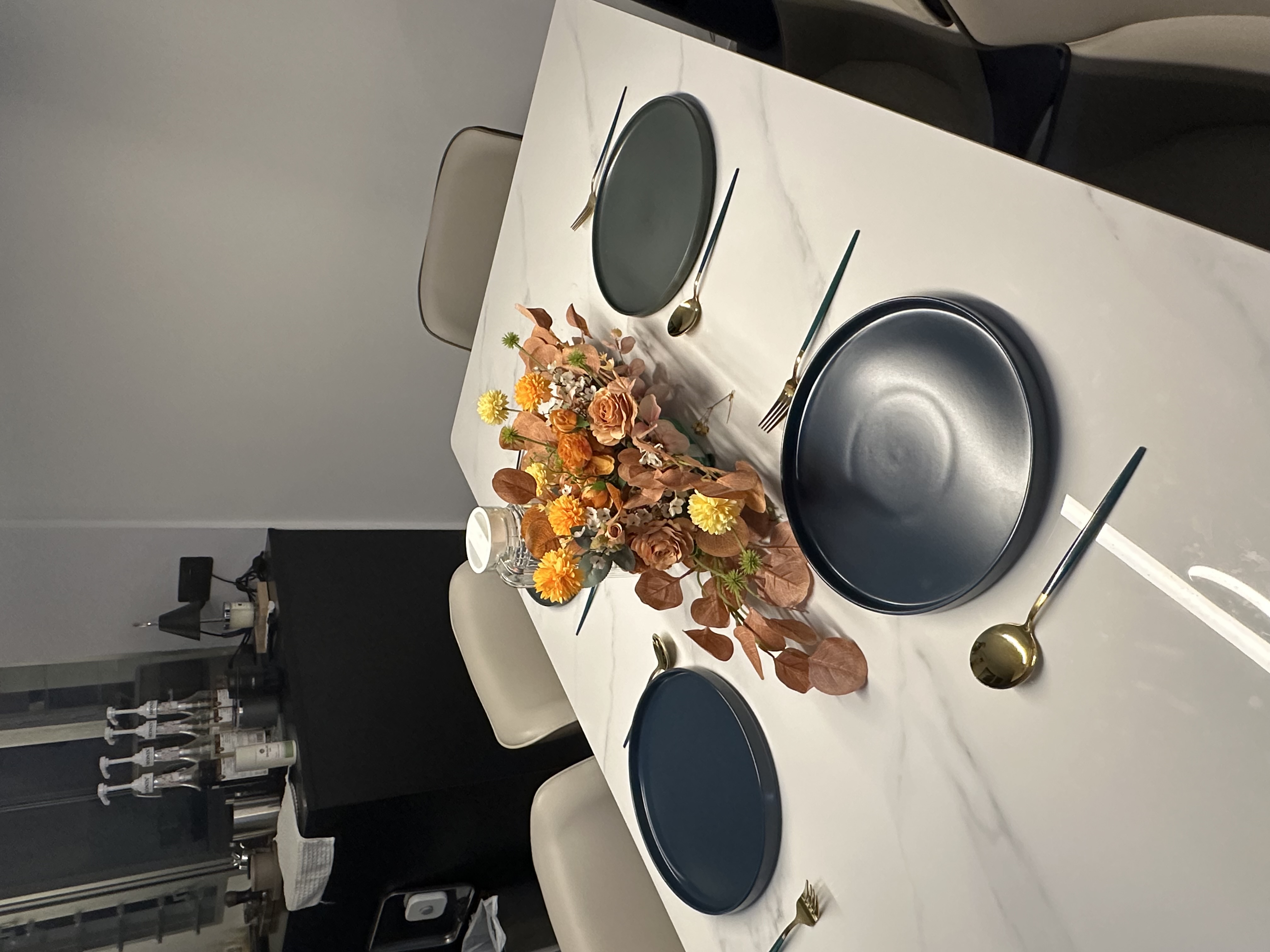 Amber-Hued Dining Space 🍂🍁🧡☕ - Modern dining table, minimalist decor, elegant table setting, white marble countertop, gold