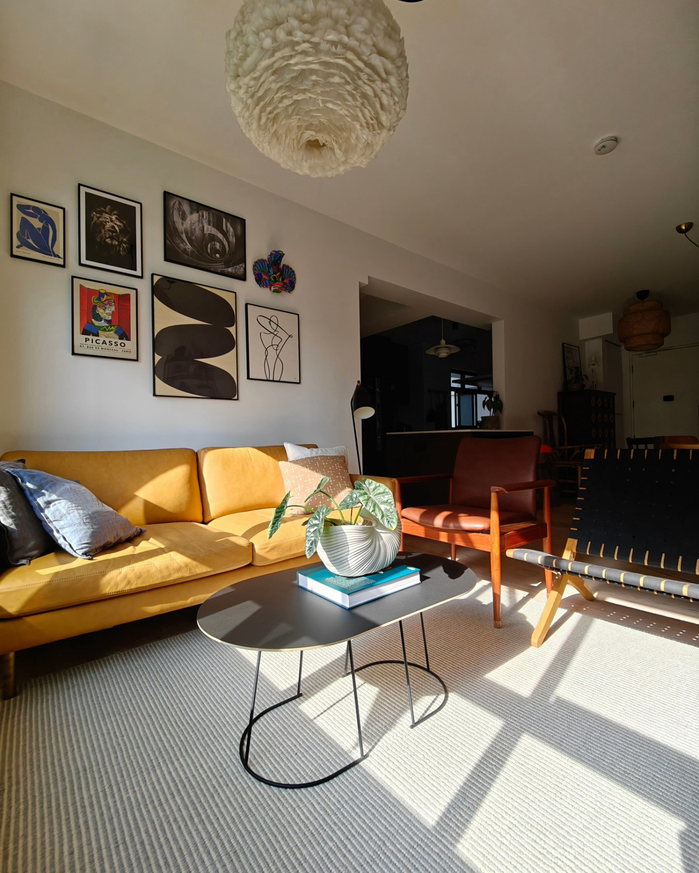 A Little Post About Our Home Style  - Modern living room, cozy seating, mustard yellow sofa, abstract art, geometric shapes