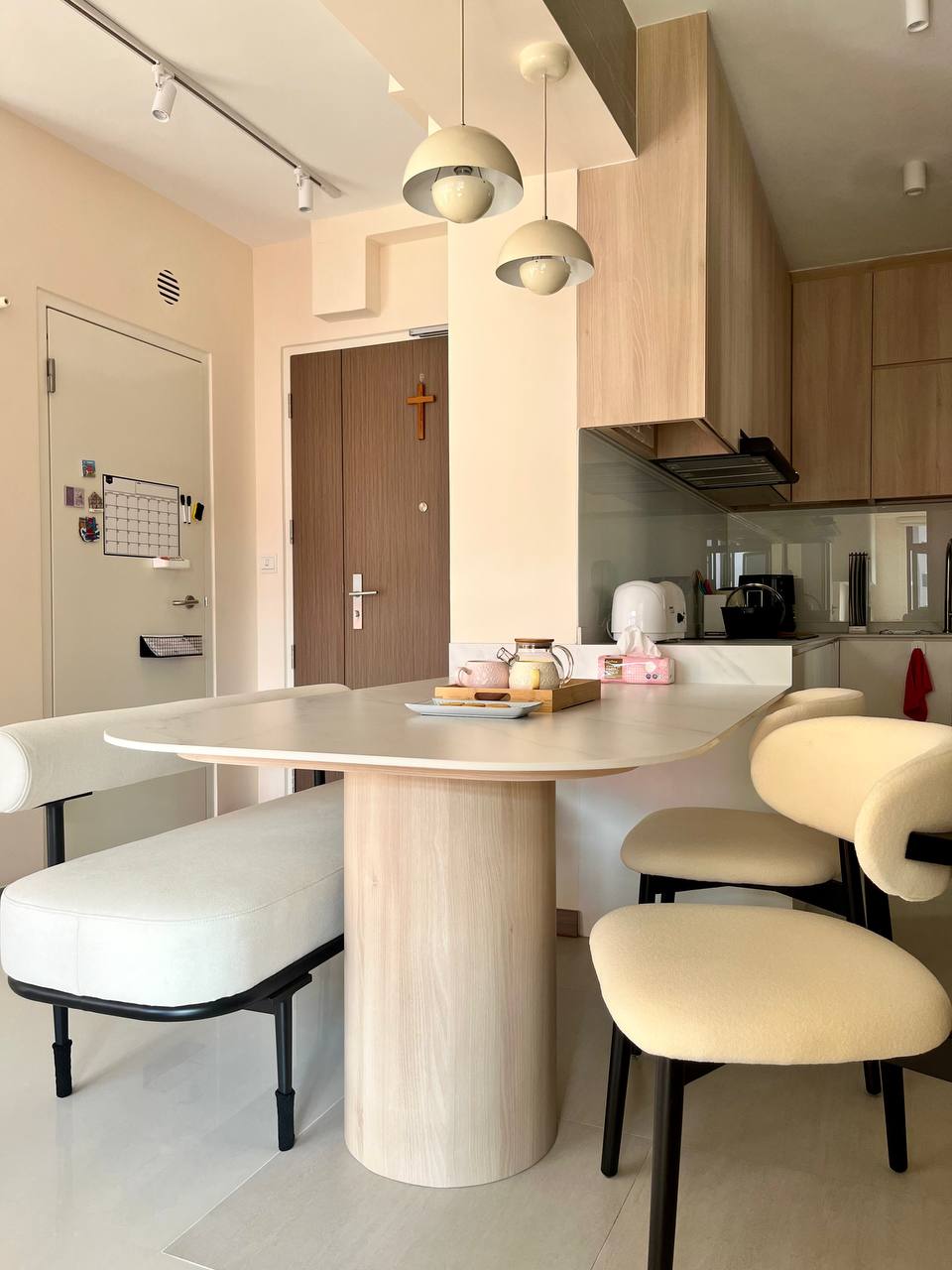 Dining Space: An Extension from Kitchen For Maximised Functionality - Modern dining room with minimalist design, light wood