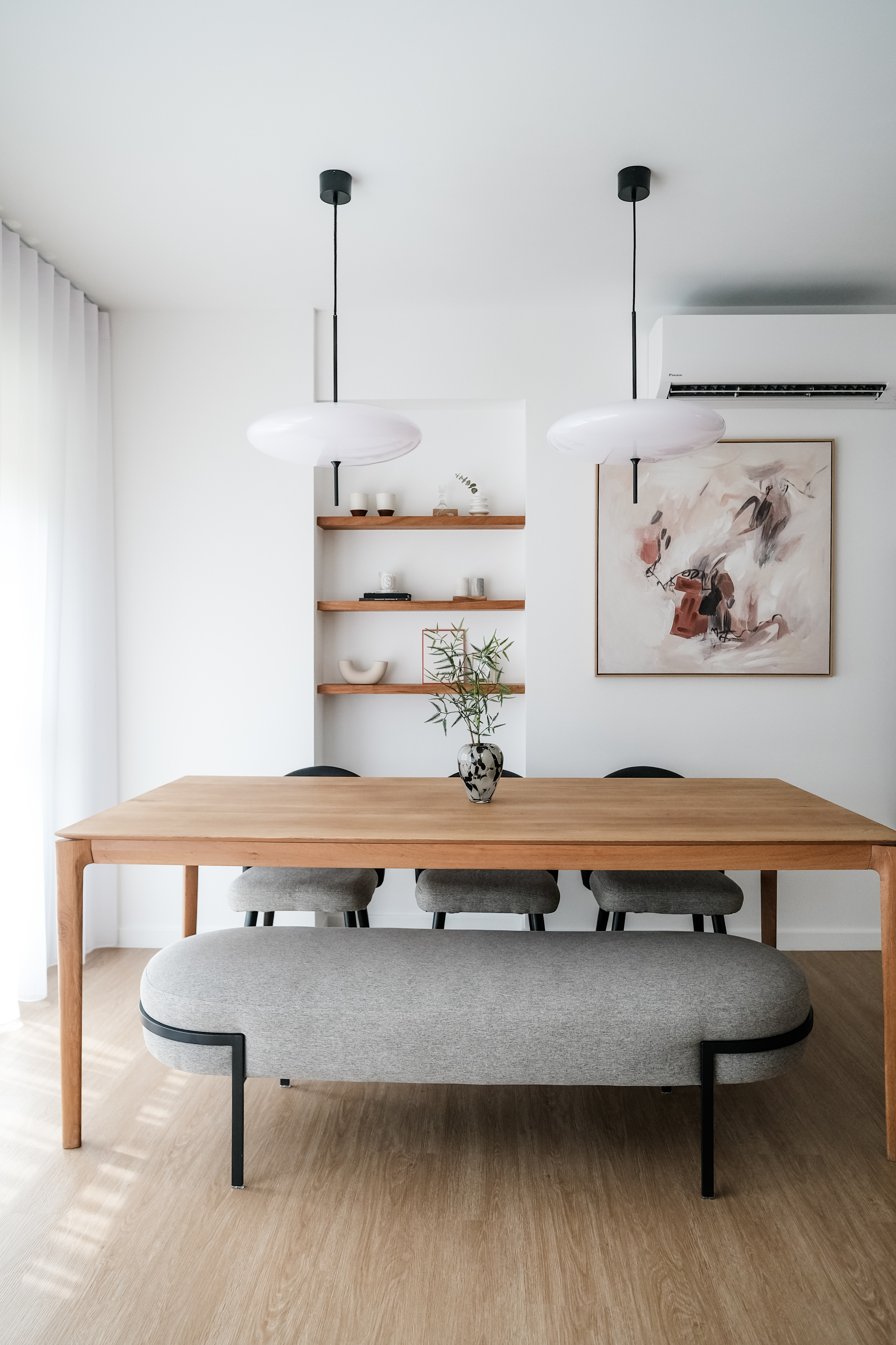 Cozy Modern Dining Room: The Heart of Our Family's Quality Time - Modern minimalist dining room, sleek black pendant lights