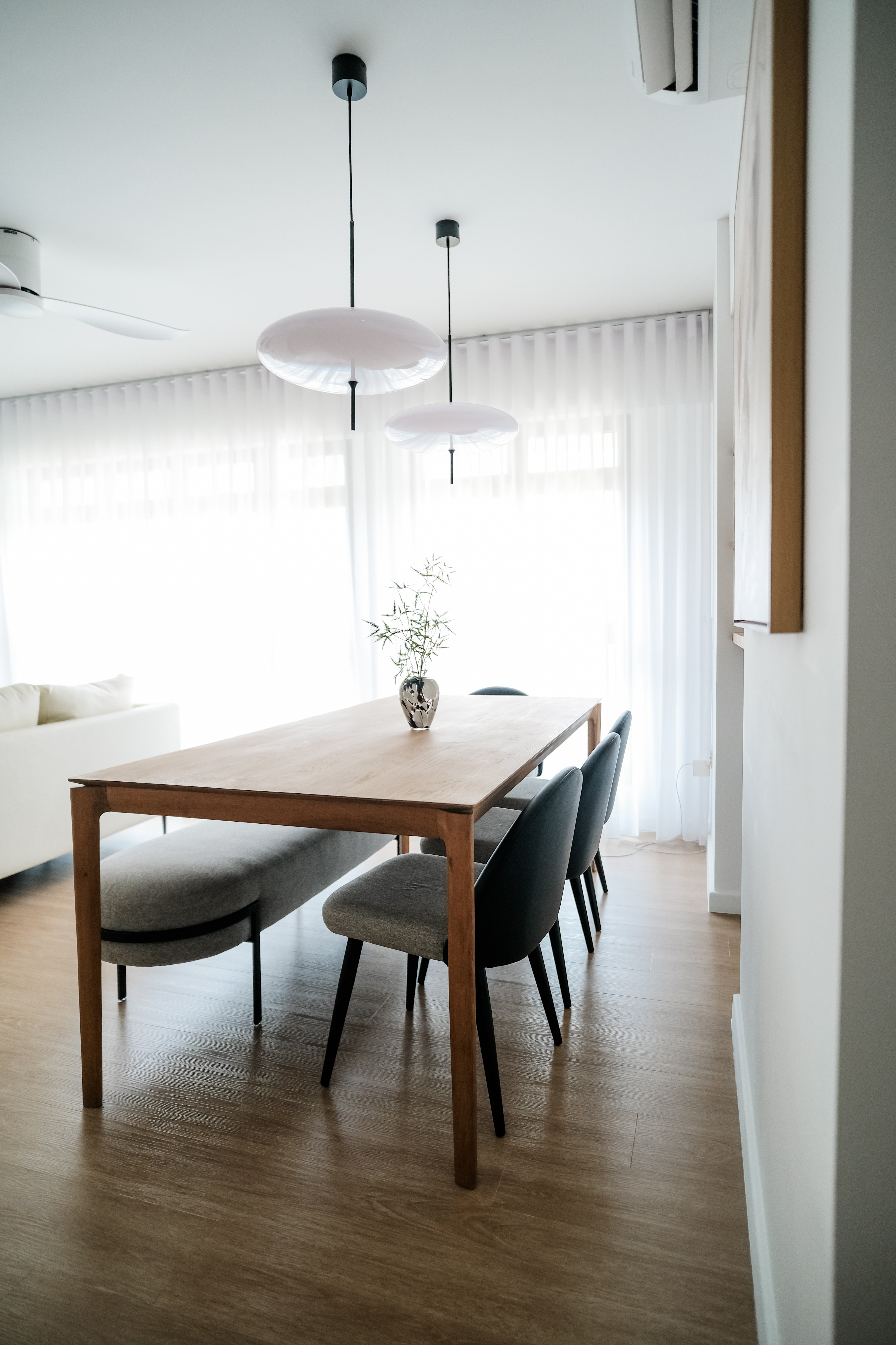 Cozy Modern Dining Room: The Heart of Our Family's Quality Time - Modern dining room with minimalist design, wooden dining