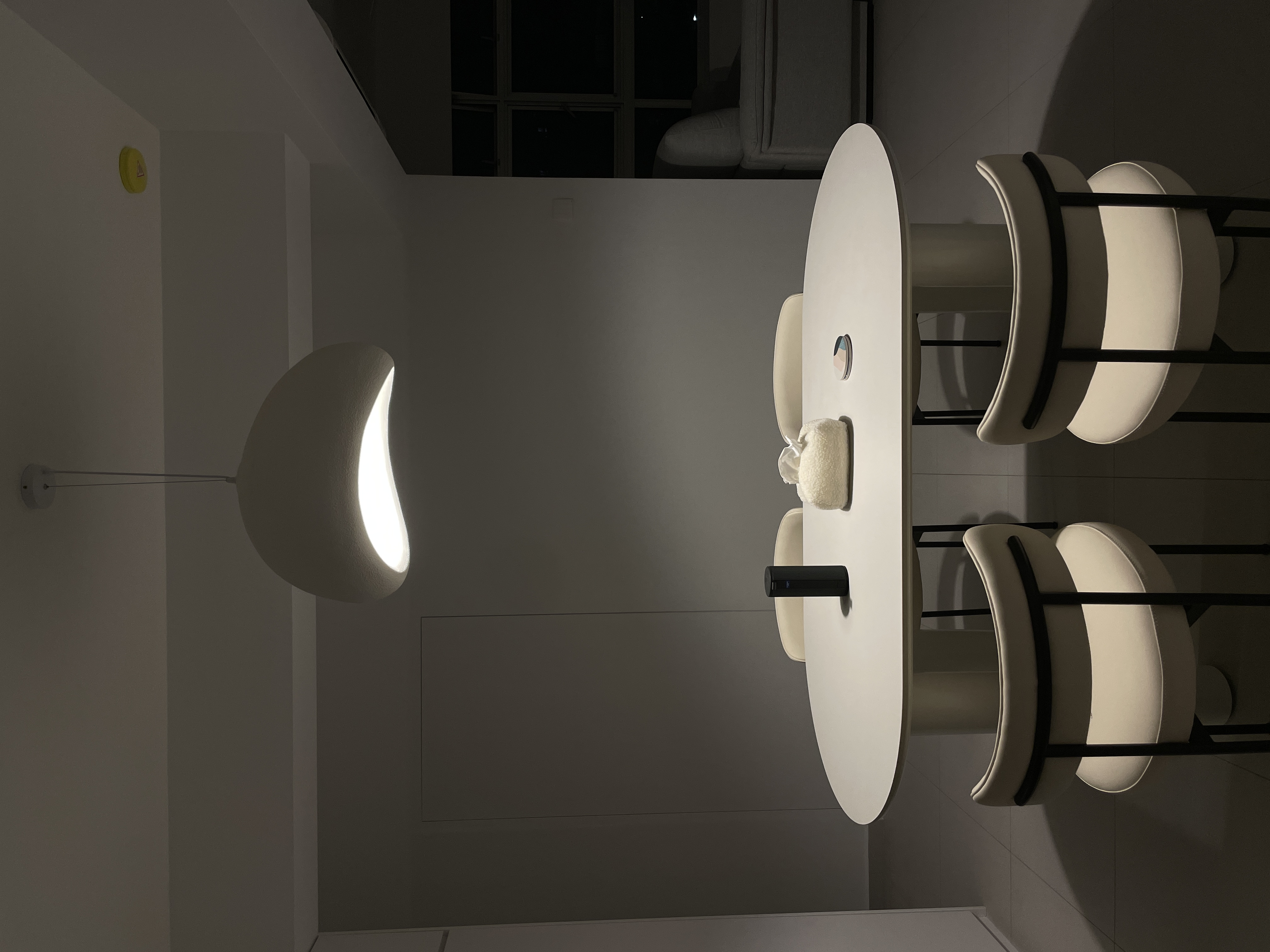 Dining Space: The Art Of Simple Dining  - Modern minimalist dining room, sleek pendant light, circular dining table, white