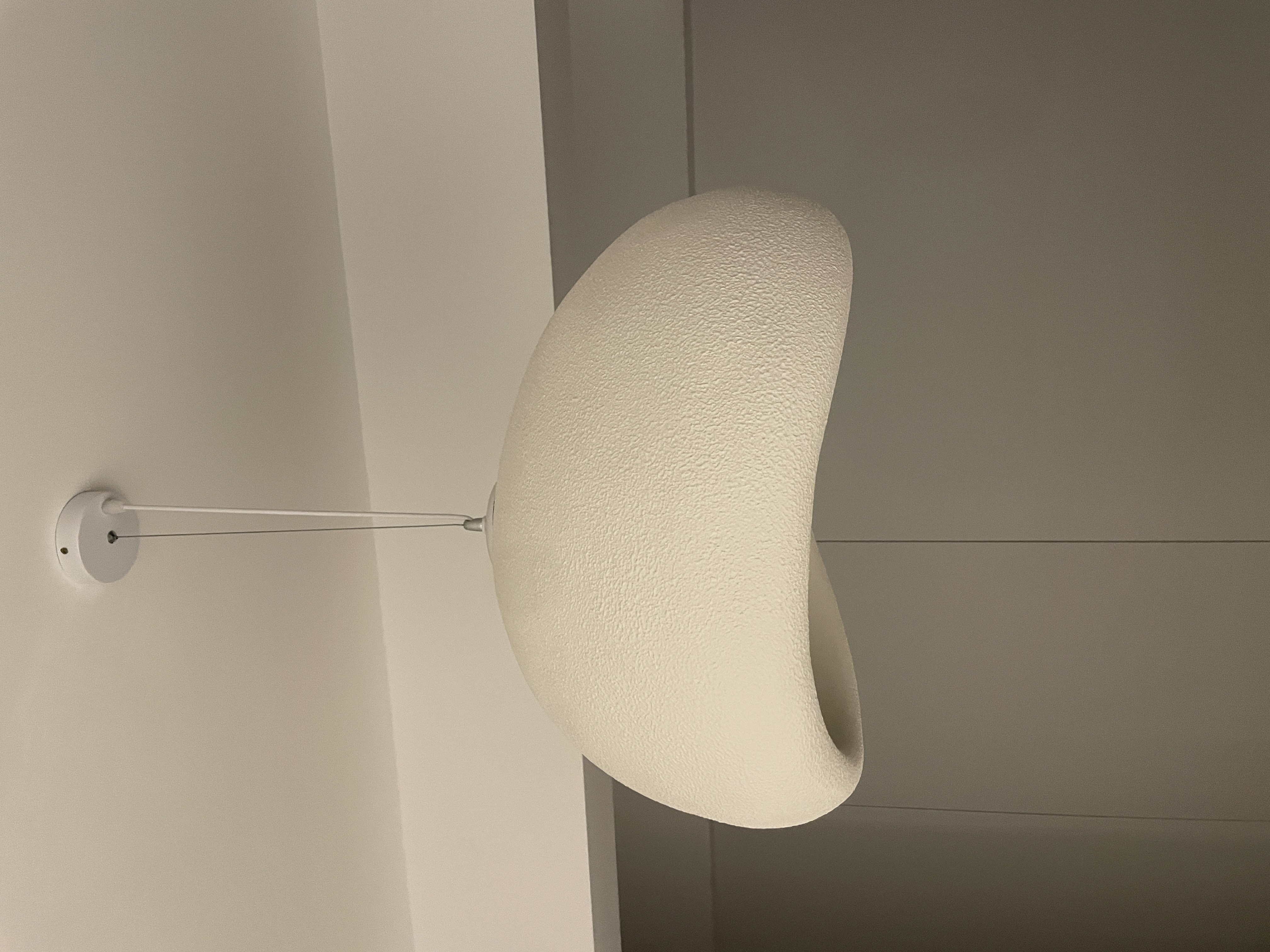 Dining Space: The Art Of Simple Dining  - Modern pendant light fixture, minimalist design, textured beige shade, sleek