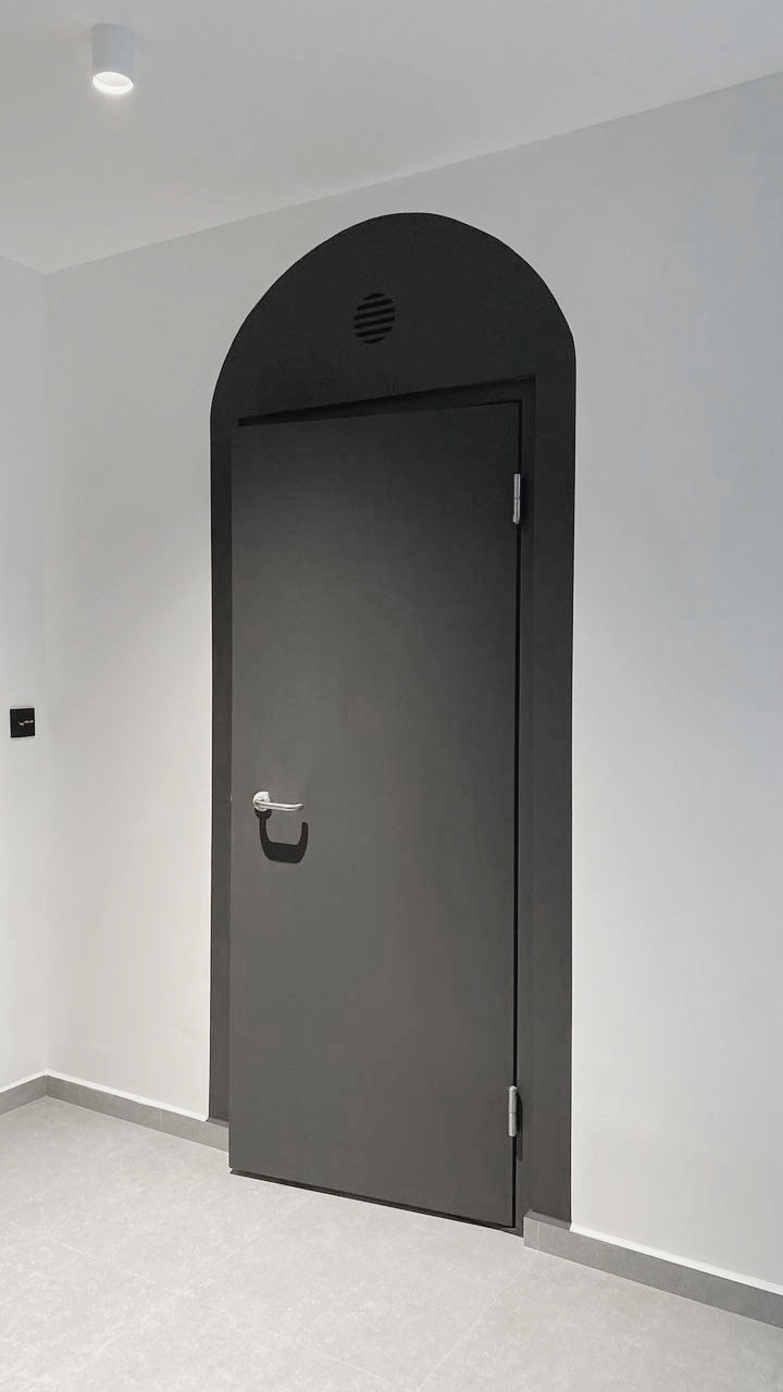 How much do arches cost?  - Modern minimalist door, sleek black finish, arched doorway, minimalist design, contemporary