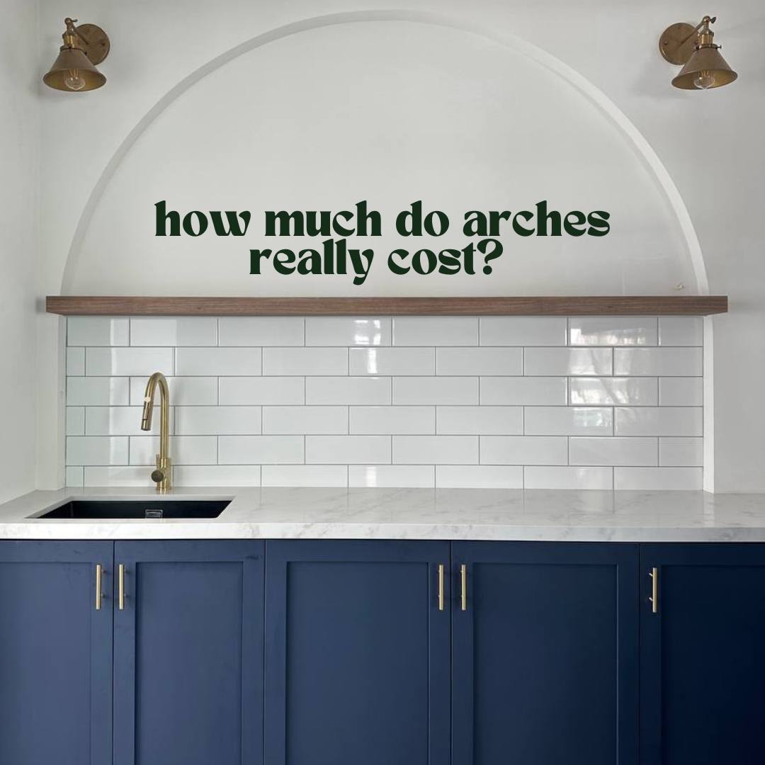 How much do arches cost?  - White tiled backsplash, gold faucet, dark blue cabinets, arched ceiling, minimalist design
