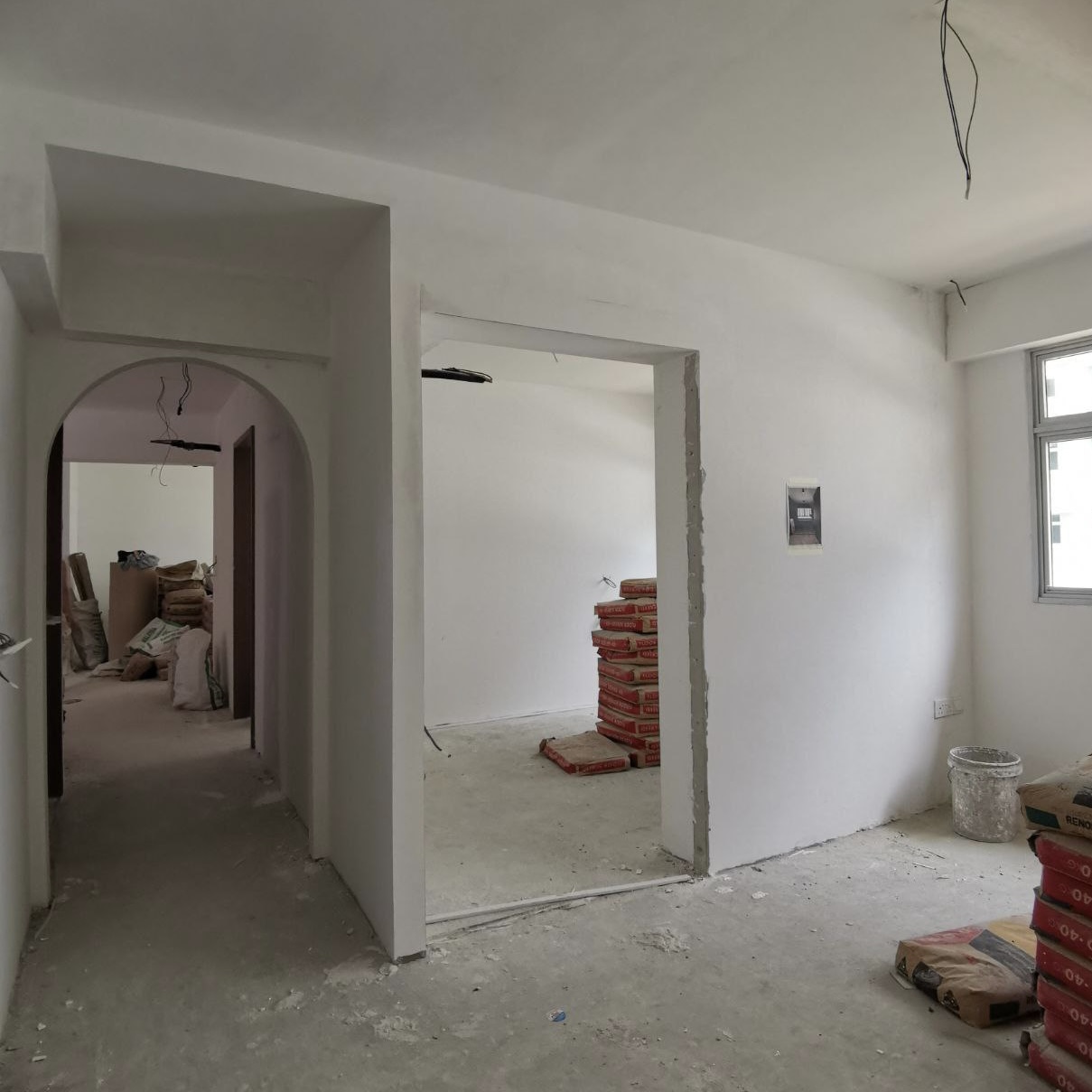 How much do arches cost?  - unfinished room, unfinished walls, construction site, renovation in progress, bare walls, white