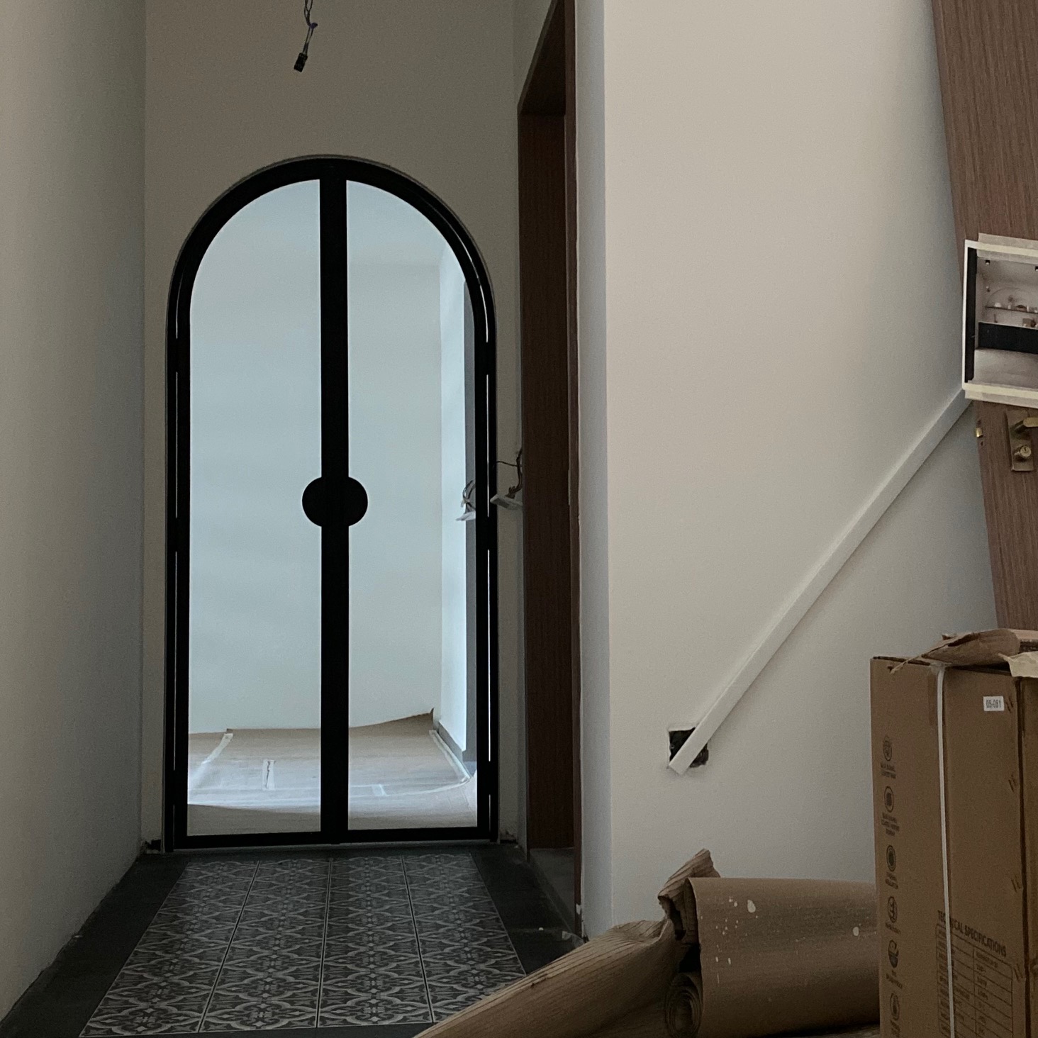 How much do arches cost?  - Arched doorway, modern design, minimalist decor, white walls, natural light, wooden trim