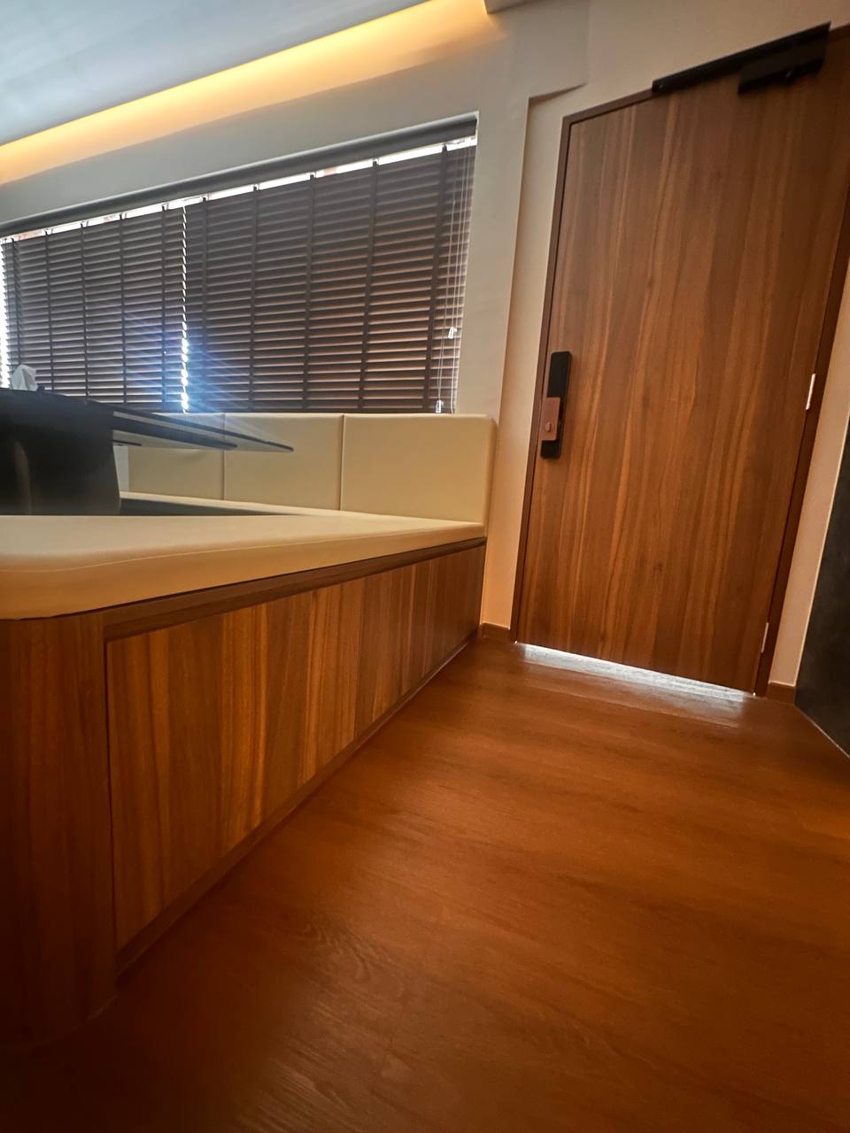 Cozy Dining Area - with Hidden Storage! - Wooden desk, modern office, large windows, blinds, ambient lighting, wooden