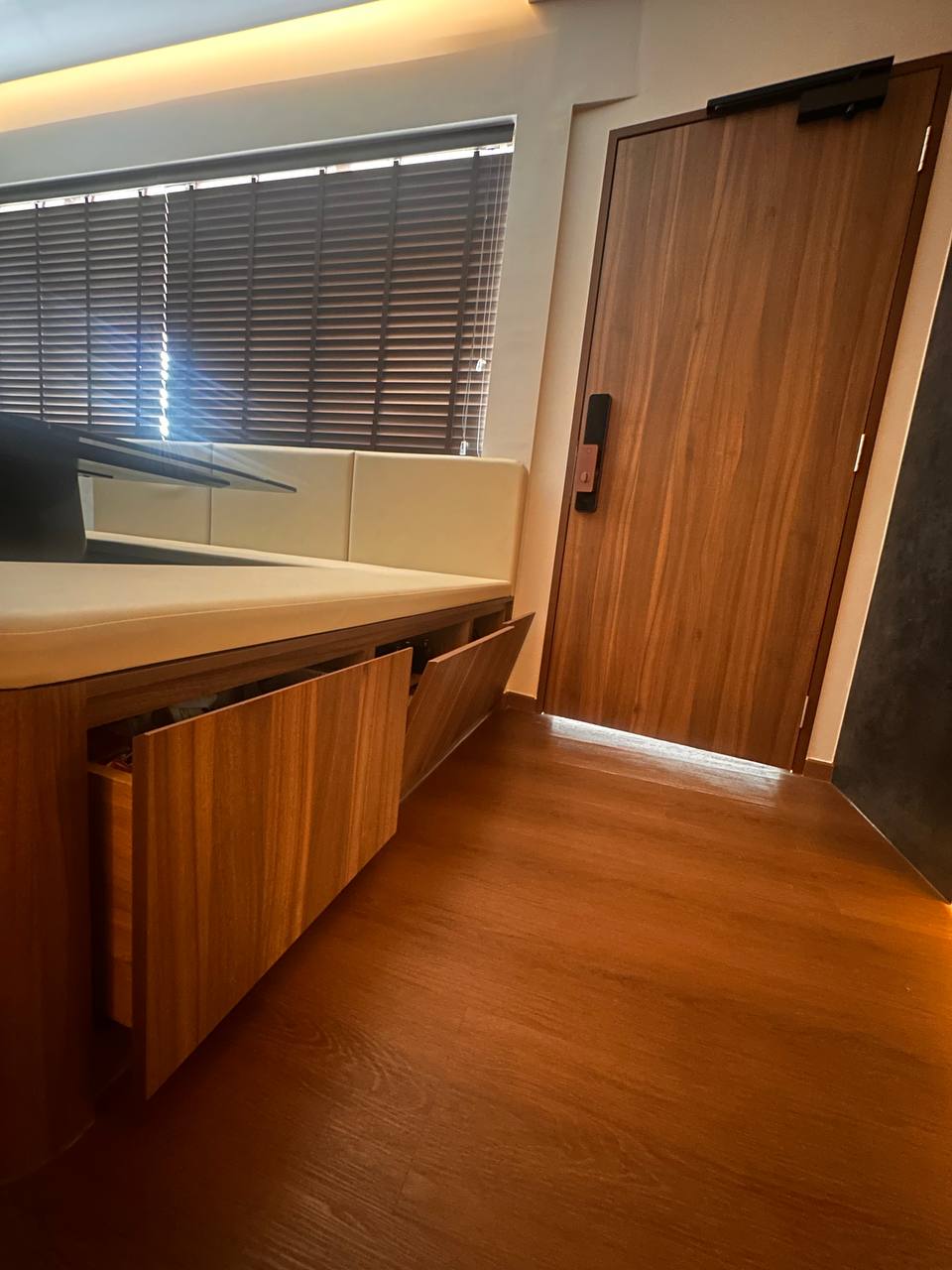 Cozy Dining Area - with Hidden Storage! - Wooden desk, modern design, minimalist space, sleek cabinetry, built-in shelving