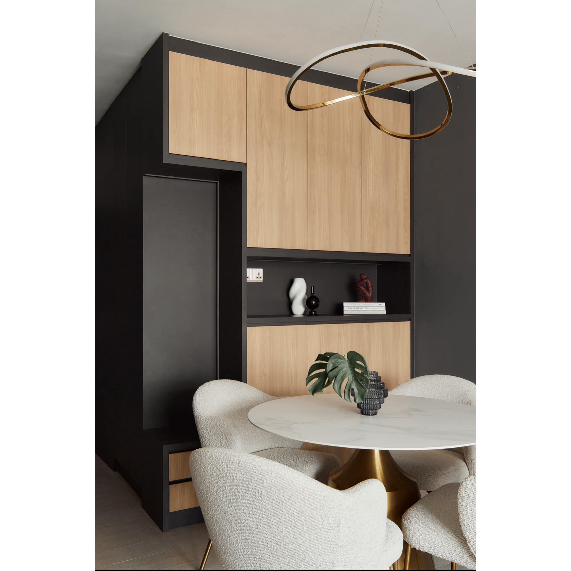 Dining In Style, Where Elegance Meets Comfort  - Modern dining room with sleek black and wooden cabinets, minimalist white