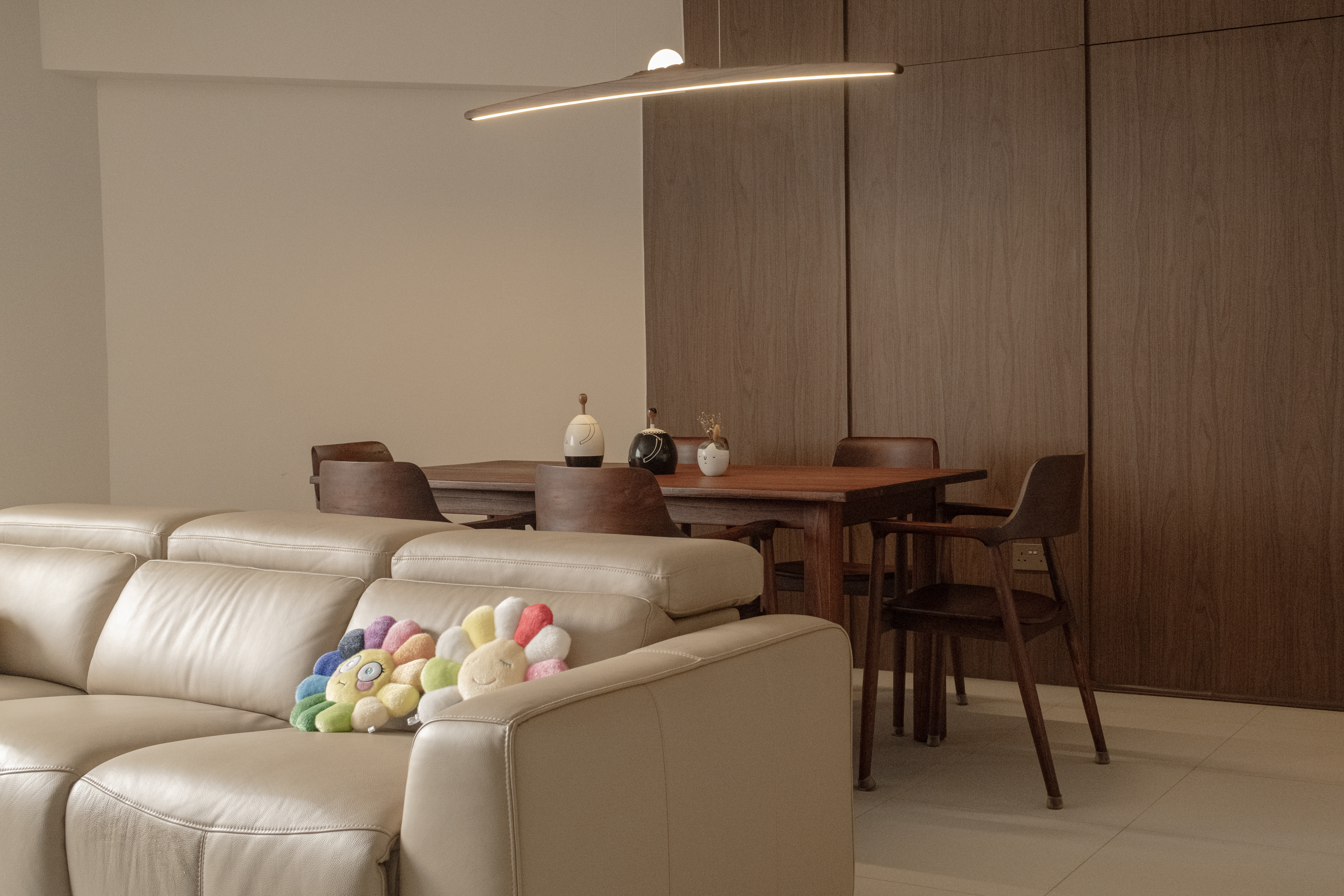 A Place to Gather: Our Dining Room Story - Leather sofa, modern dining room, wooden dining table, minimalist decor, beige