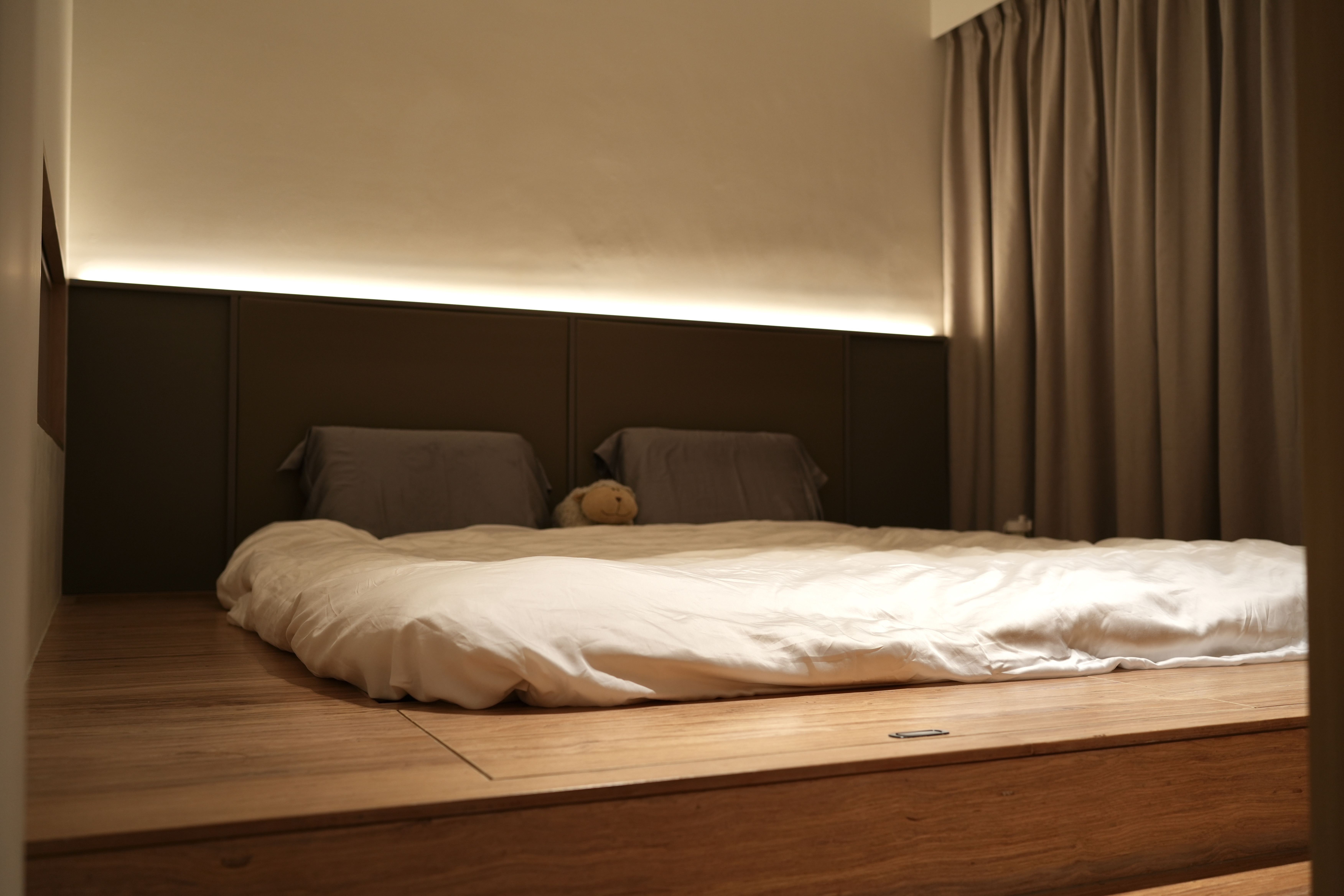 Choosing an ID is as important as choosing your home - Modern minimalist bedroom, cozy bed, wooden flooring, soft lighting