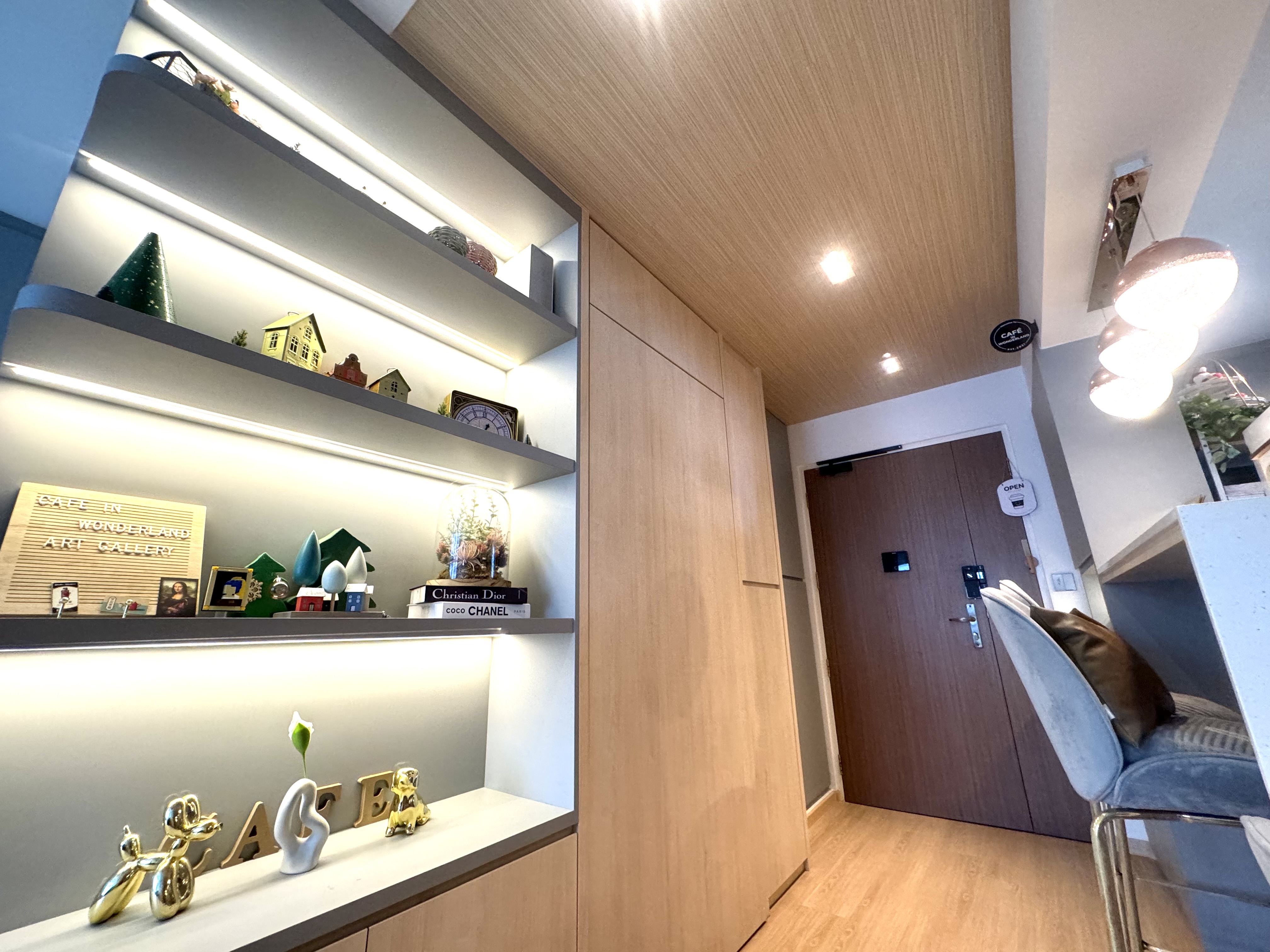 Secret Storage Spaces: The Collections Behind the Doors - Shelf with decorative items, illuminated by soft lighting, modern