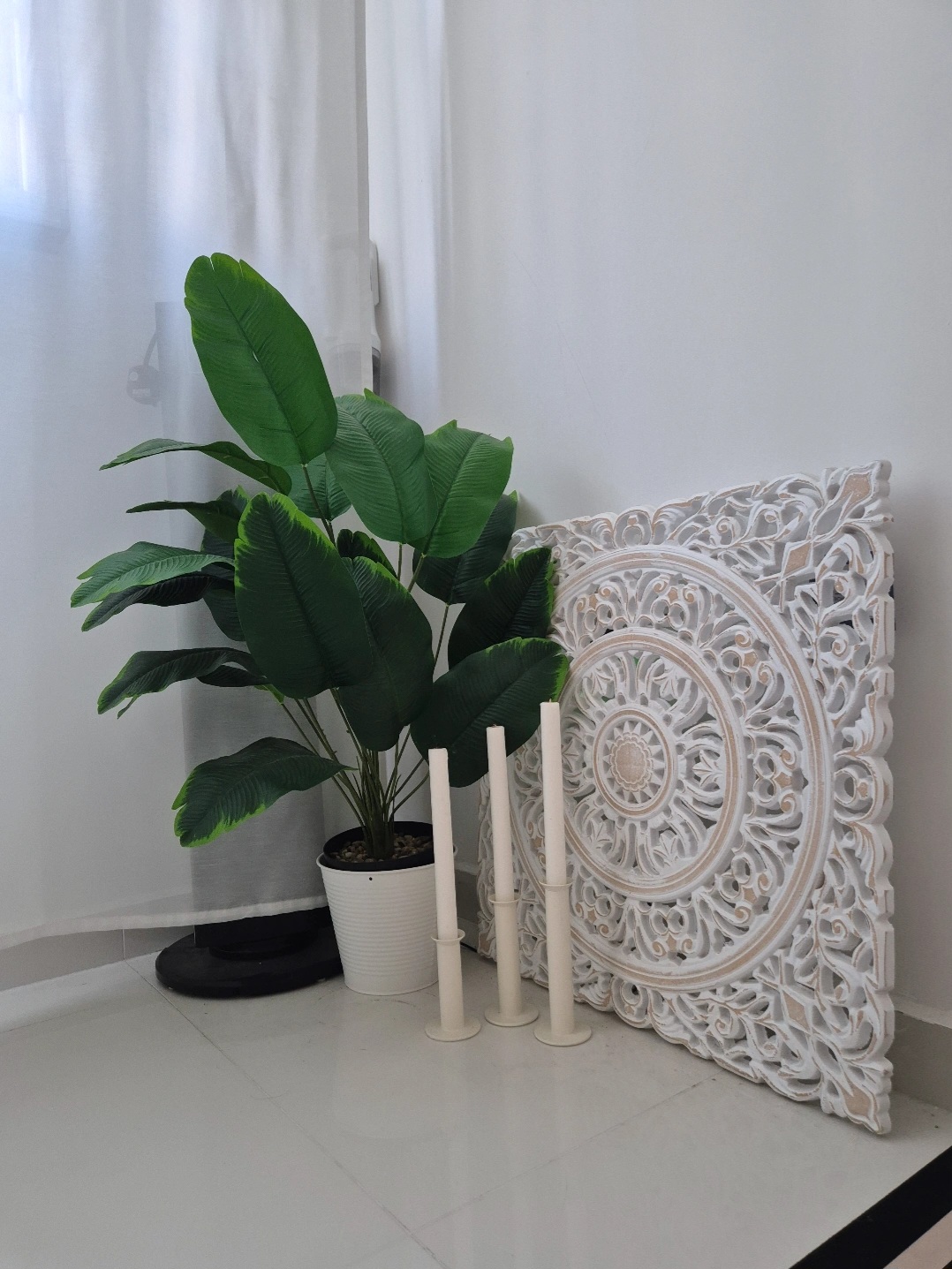 Hosting tips by punggoHField - Green potted plant, white sheer curtain, indoor setting, modern decor, white ceramic vase
