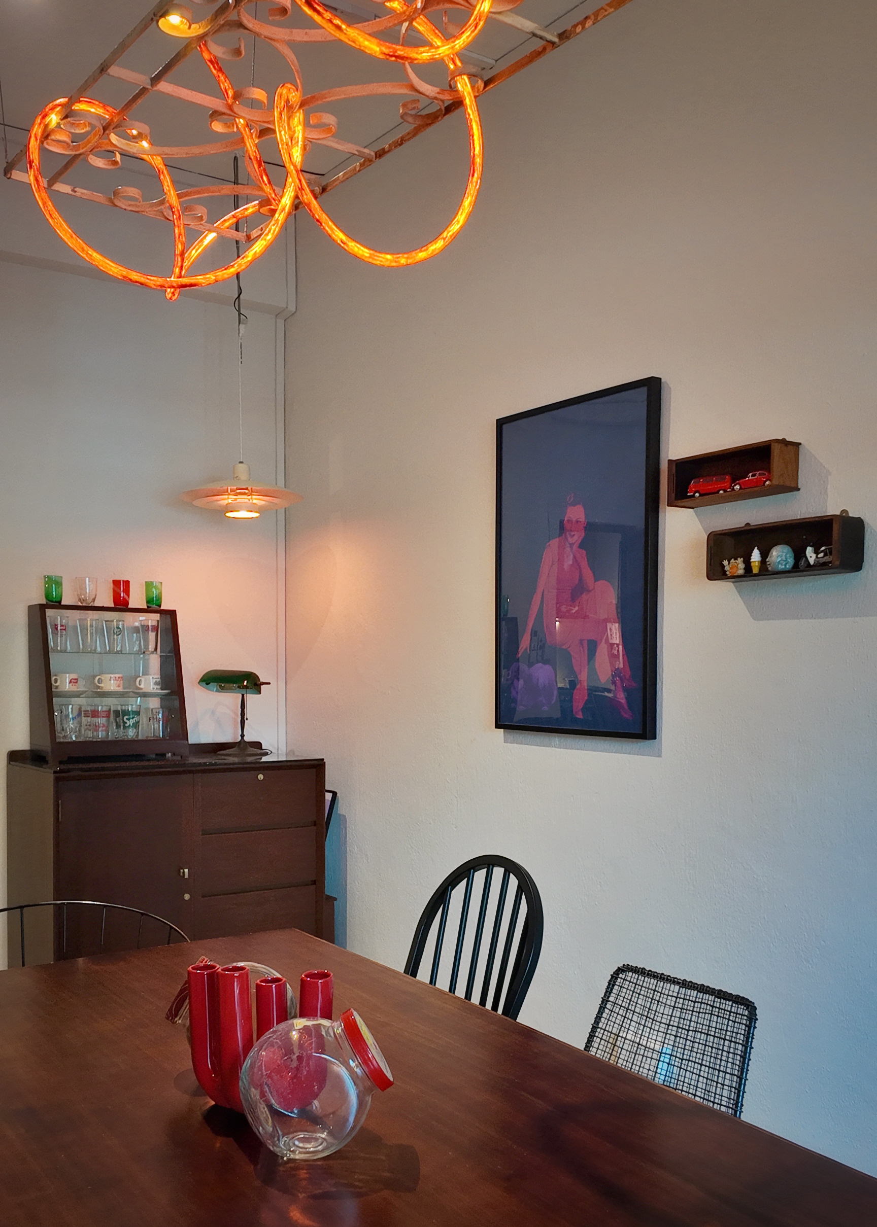 Ling, Ling! Dinner’s served!  - Modern dining room, contemporary decor, abstract art, warm lighting, wooden furniture, black