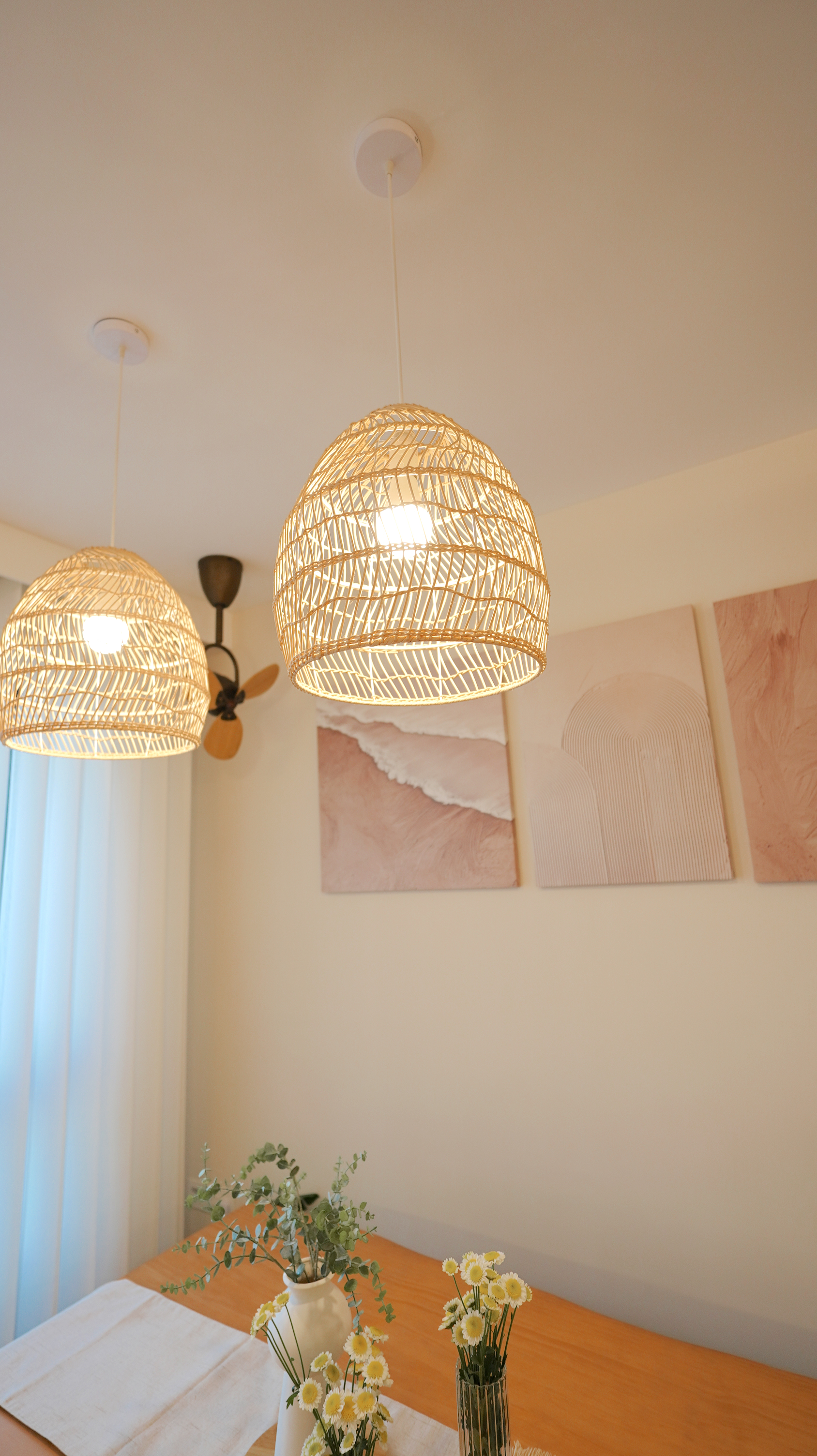 Communal dining space - Calming vibes with a touch of modern farmhouse - Wrought iron pendant lights, soft ambient lighting