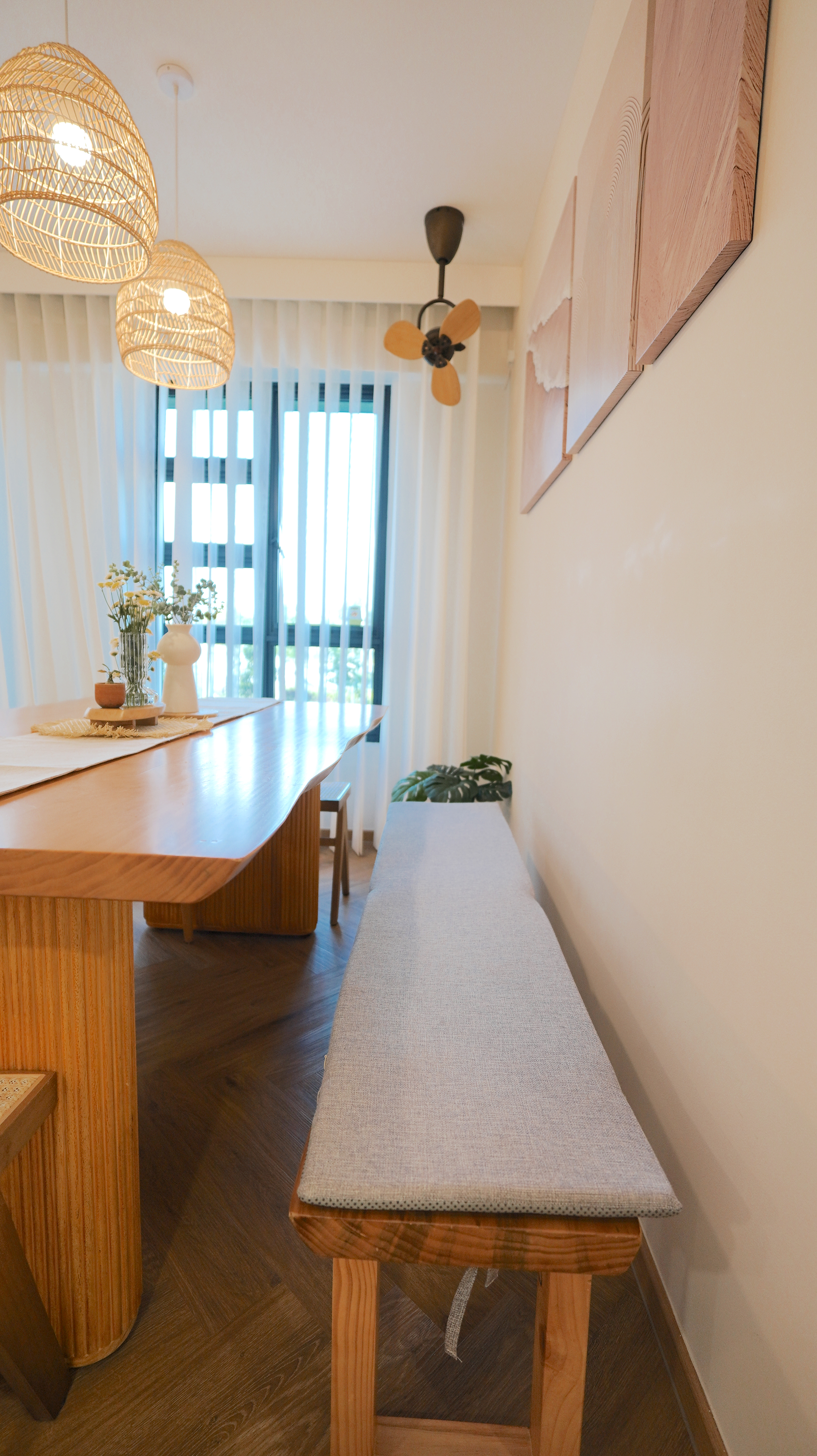 Communal dining space - Calming vibes with a touch of modern farmhouse - Wooden dining table, light beige cushioned bench
