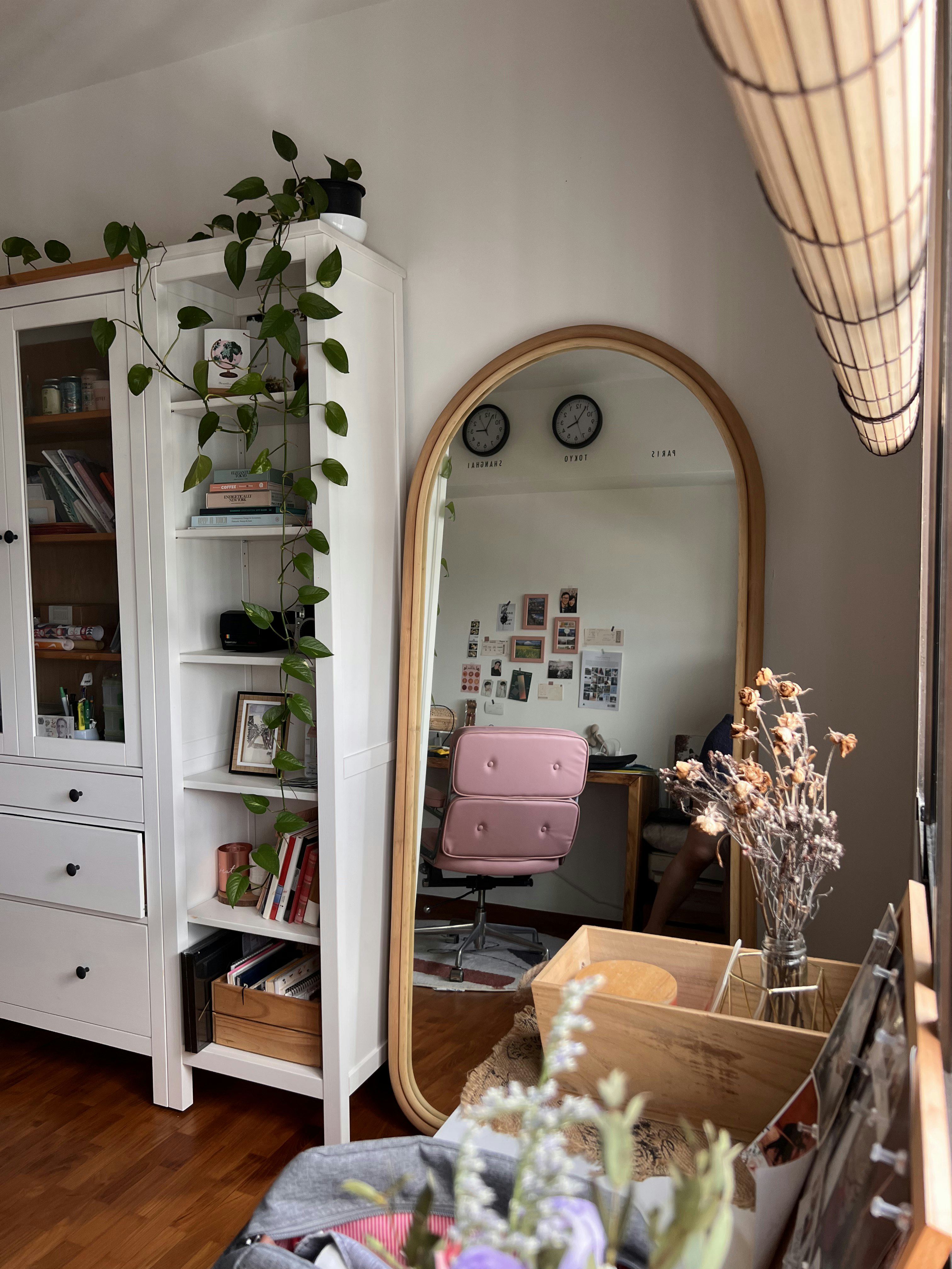 Classic Farmhouse inspired 4rm Resale HDB in Telok Blangah - White wooden cabinet, green plant, wooden shelf, pink chair