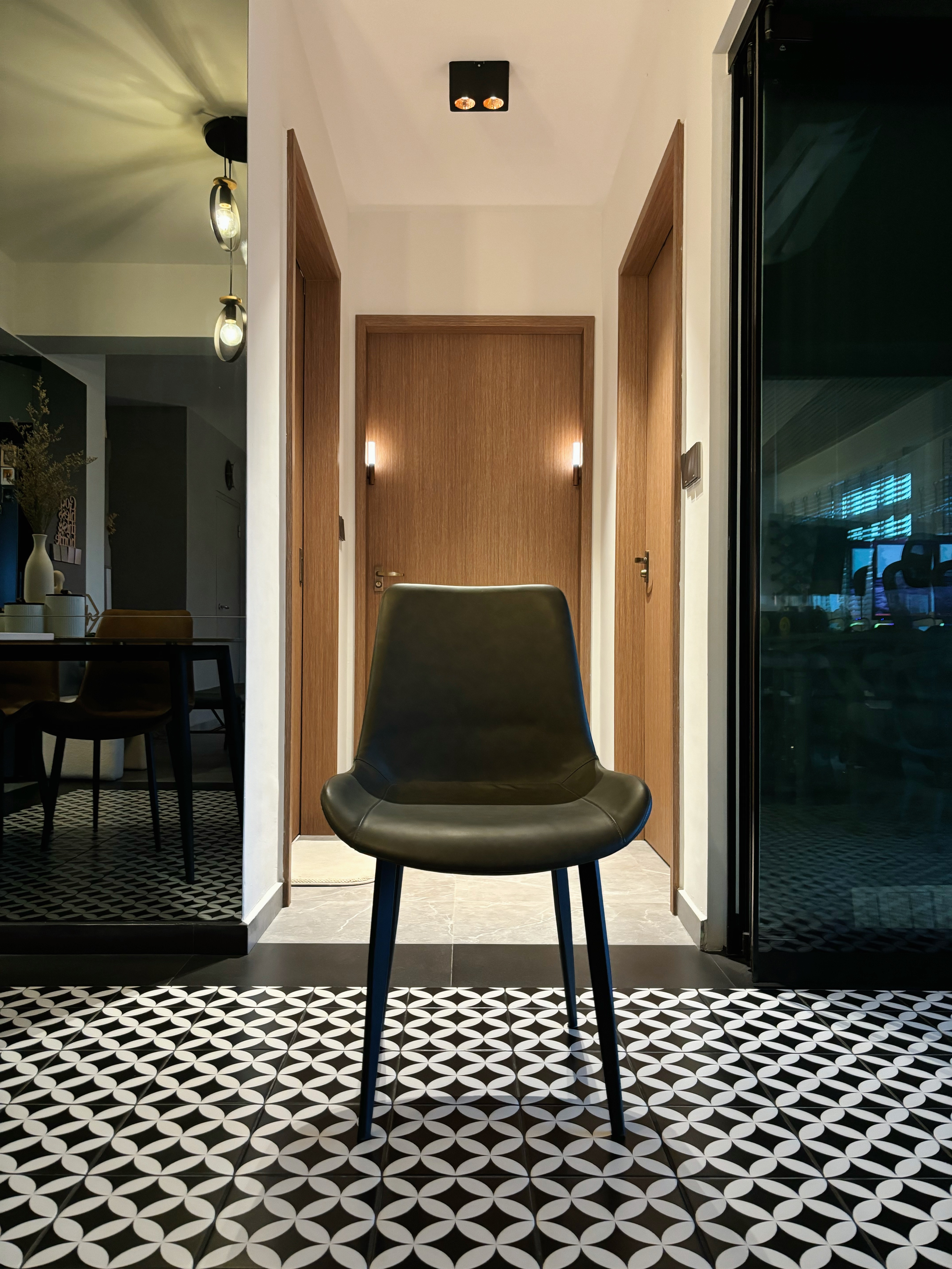 Meal and Greet - Modern minimalist interior, sleek chair, geometric patterned floor, wooden doors, pendant lights, dining