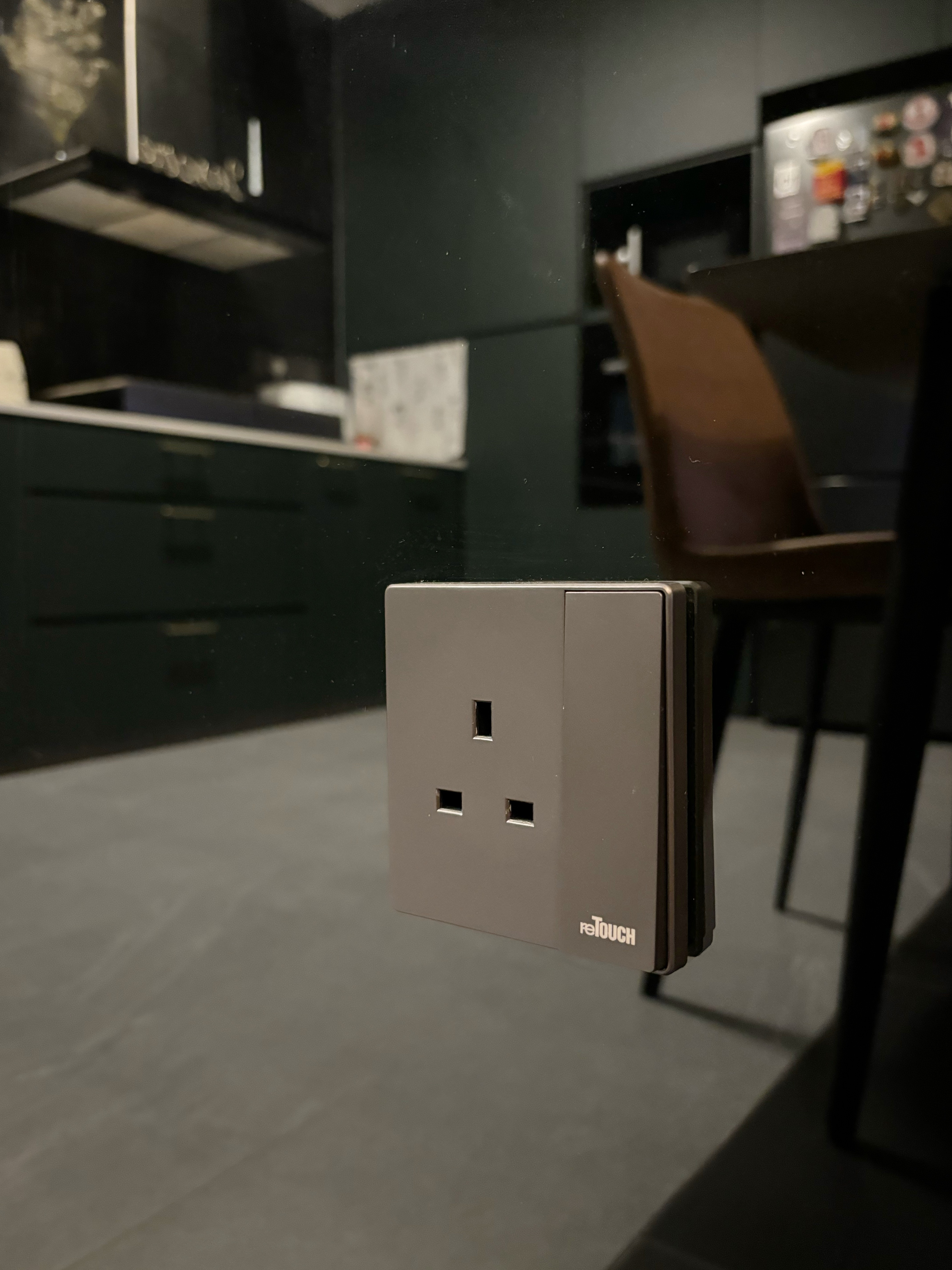 Meal and Greet - Modern kitchen, sleek design, minimalist, contemporary, industrial style, dark cabinets, black countertops