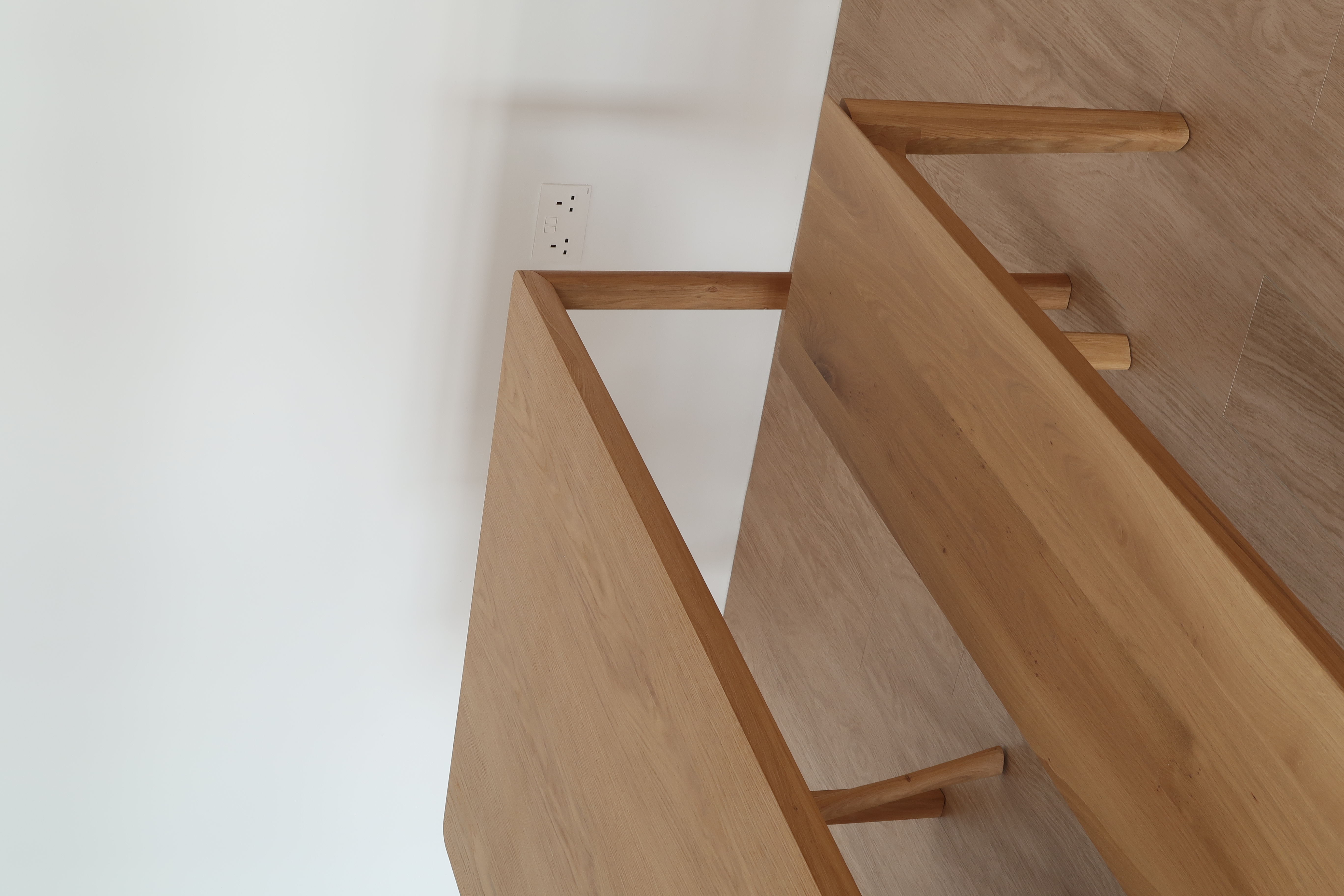 Dining Space: A Cosy Haven for Gatherings and More - Wooden staircase, minimalist design, modern aesthetic, natural wood