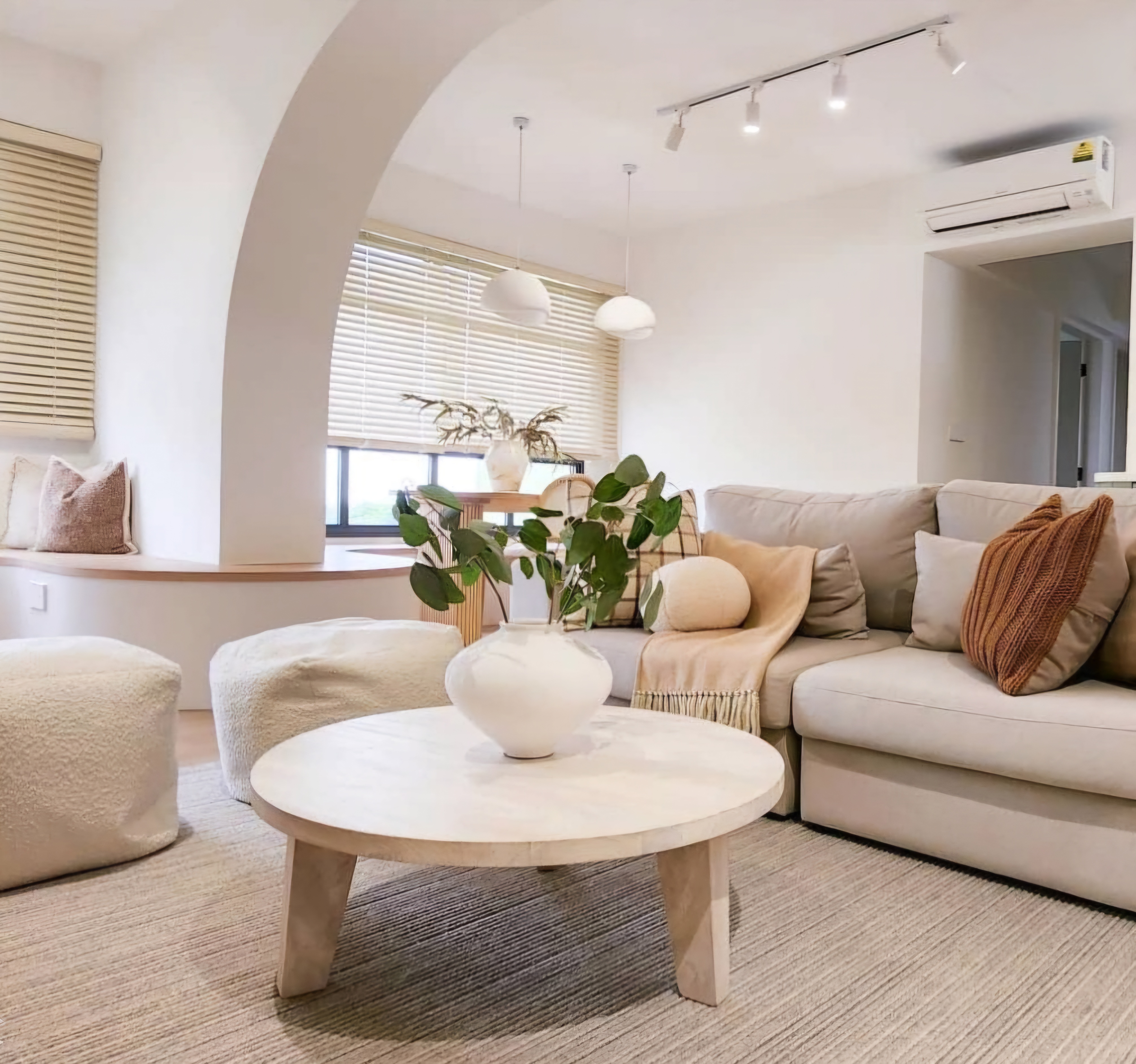 Renders vs. Reality: A Visual Journey - Modern living room, cozy atmosphere, minimalist decor, neutral color palette, white