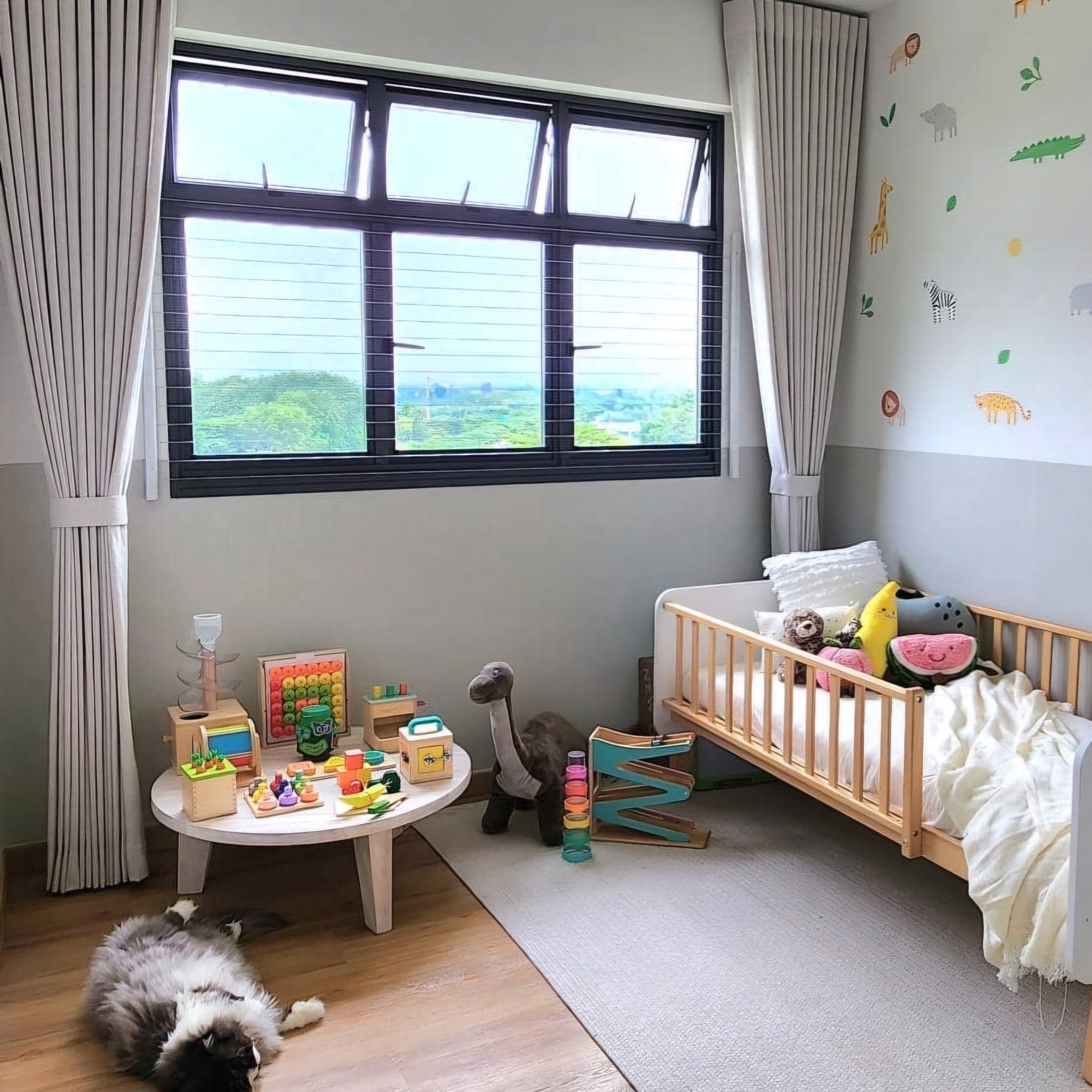 Renders vs. Reality: A Visual Journey - Baby crib, colorful toys, stuffed animals, wooden crib, white blanket, wooden table