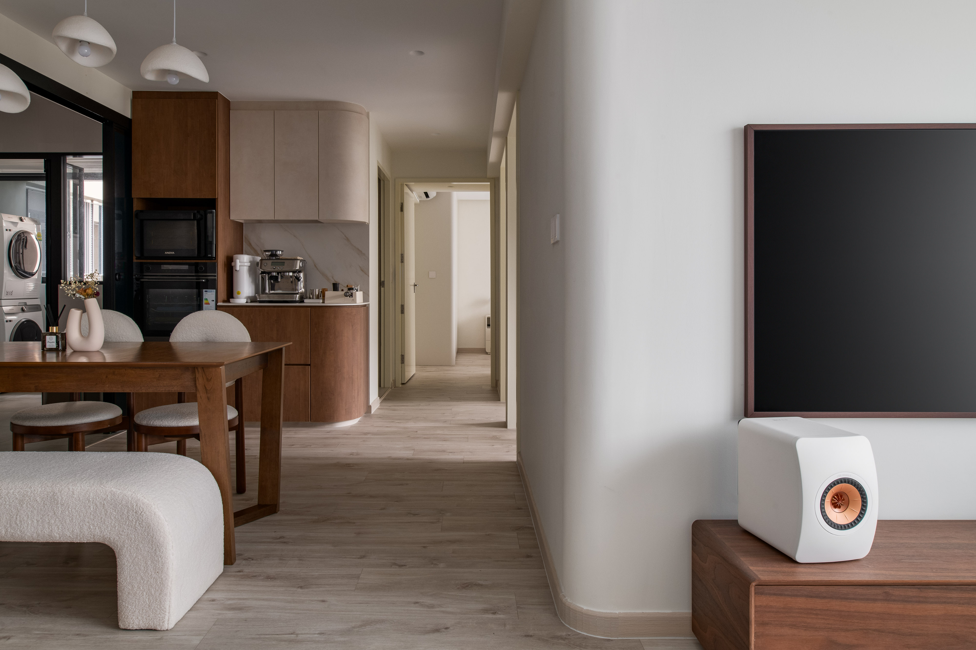 The Reality Behind Renders: What Every Homeowner Should Know - Modern minimalist kitchen with wooden cabinets, stainless