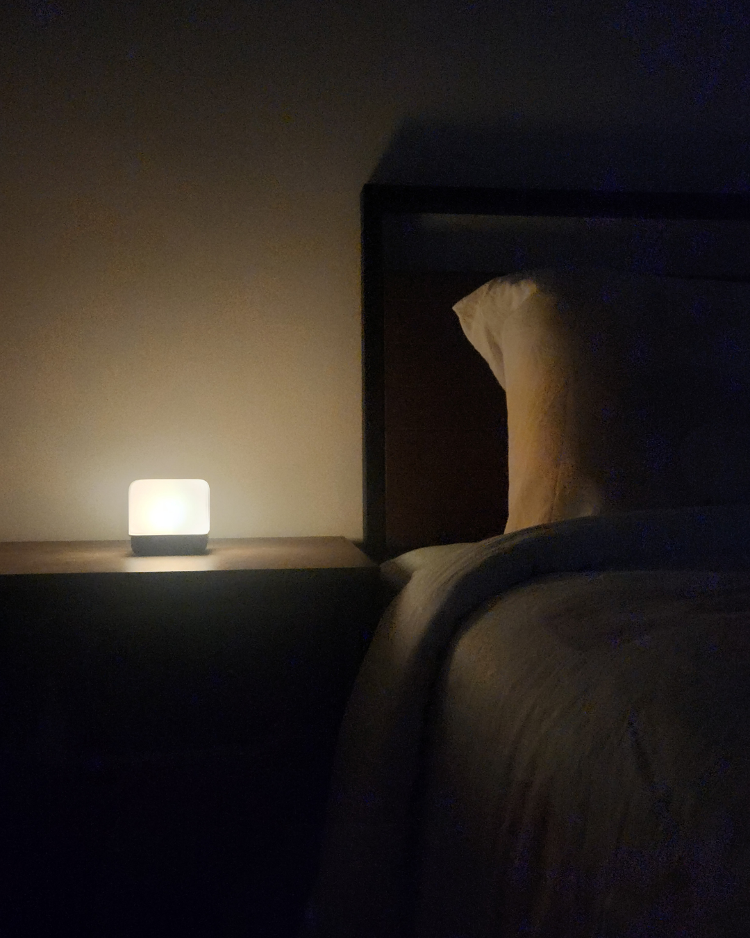 Dream & Prep: Our Functional Dual-Zone Bedroom Design - dimly lit bedroom, bedside table, soft glow, warm light, cozy