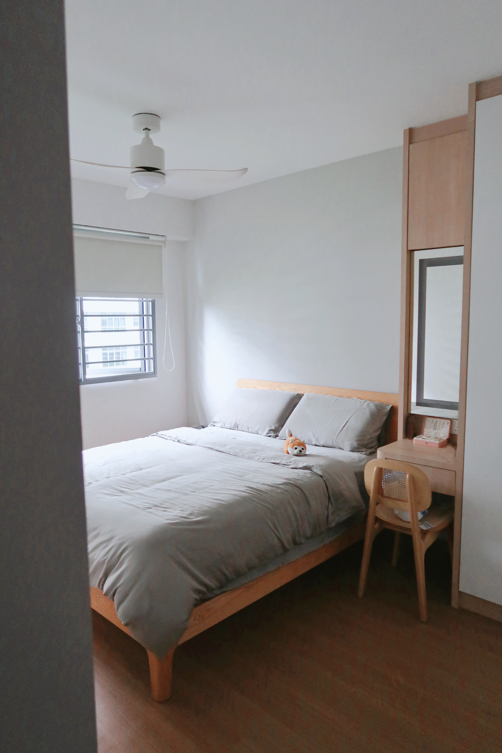 Snoozing off in our comfort Scandinavian bedroom  - Modern bedroom with wooden furniture, neutral color palette, large bed